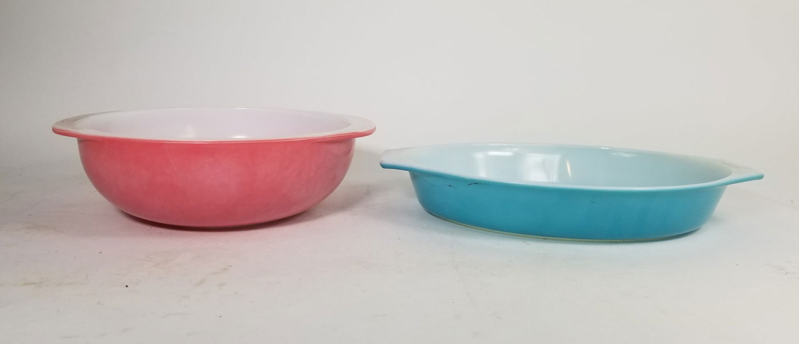 Two Vintage Pieces of Pyrex Cookware: Two Vintage Pieces of Pyrex Cookware Size 2" x 13" x 9" Literature Brooks Auction – Online Auction Terms & Conditions ———————————