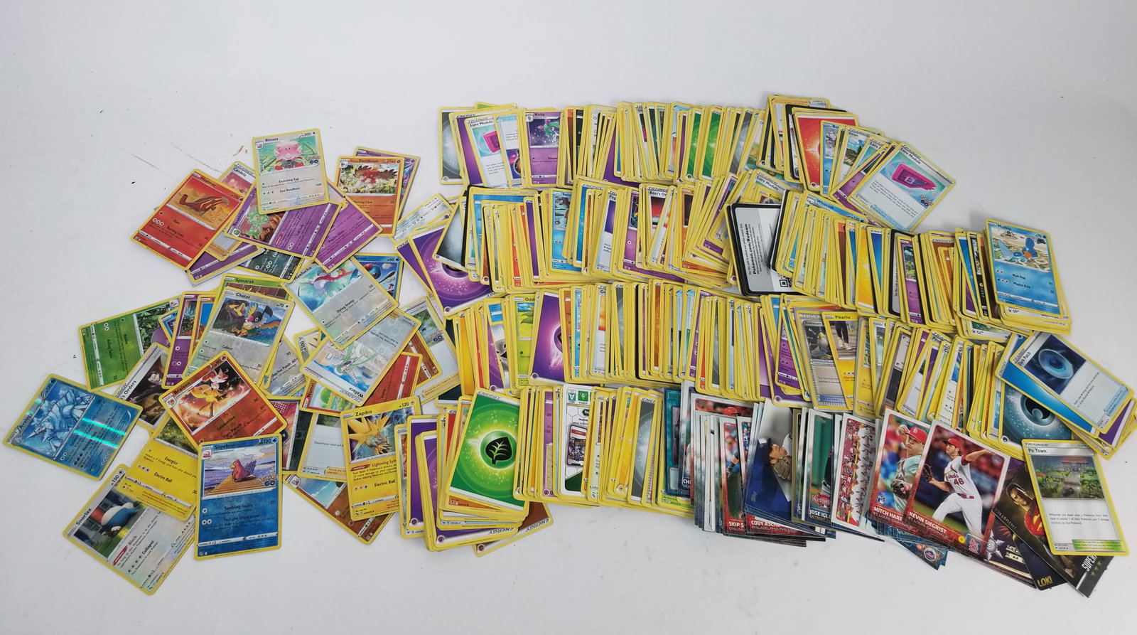 Trading Card Assortment ft. Pokemon Holos & Rares: Trading Card Assortment ft. Pokemon Holos & Rares Size 7" x 12" x 12" Literature Brooks Auction – Online Auction Terms & Conditions —————————