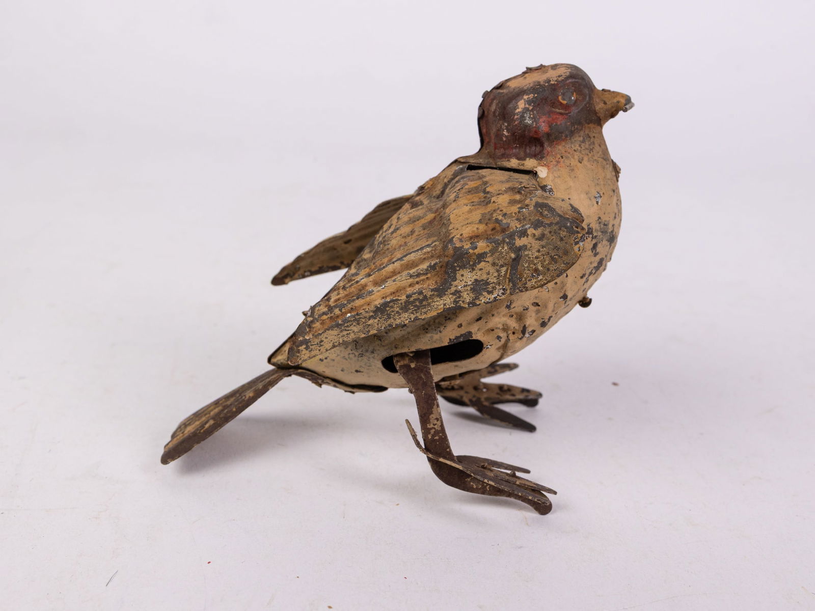 Early Tin Songbird Wind Up Toy: Early Tin Songbird Wind Up Toy Literature Brooks Auction is not responsible for outbids. Questions? Call the office at (856) 694-2960 or email us directly at info@brooks.auction. • Please read