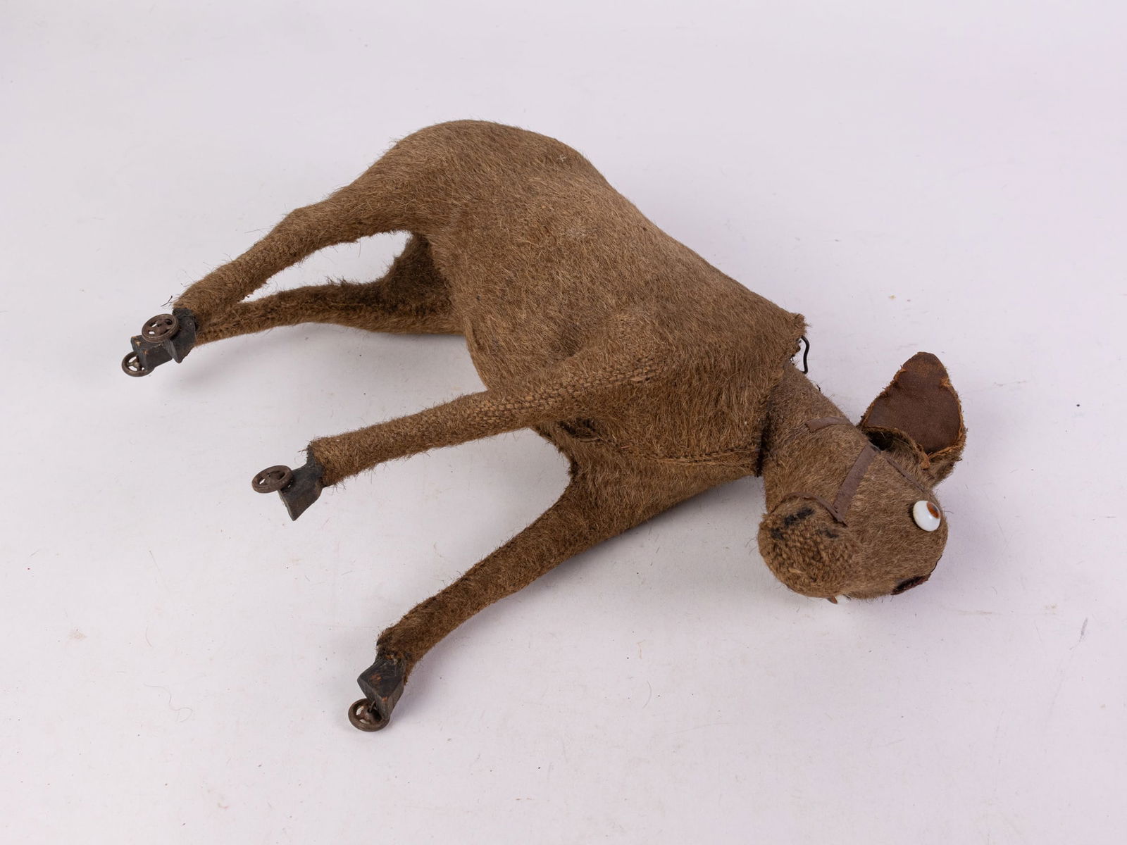 Antique Pull Along Nodding Donkey Toy: Antique Pull Along Nodding Donkey Toy Literature Brooks Auction is not responsible for outbids. Questions? Call the office at (856) 694-2960 or email us directly at info@brooks.auction. • Pleas
