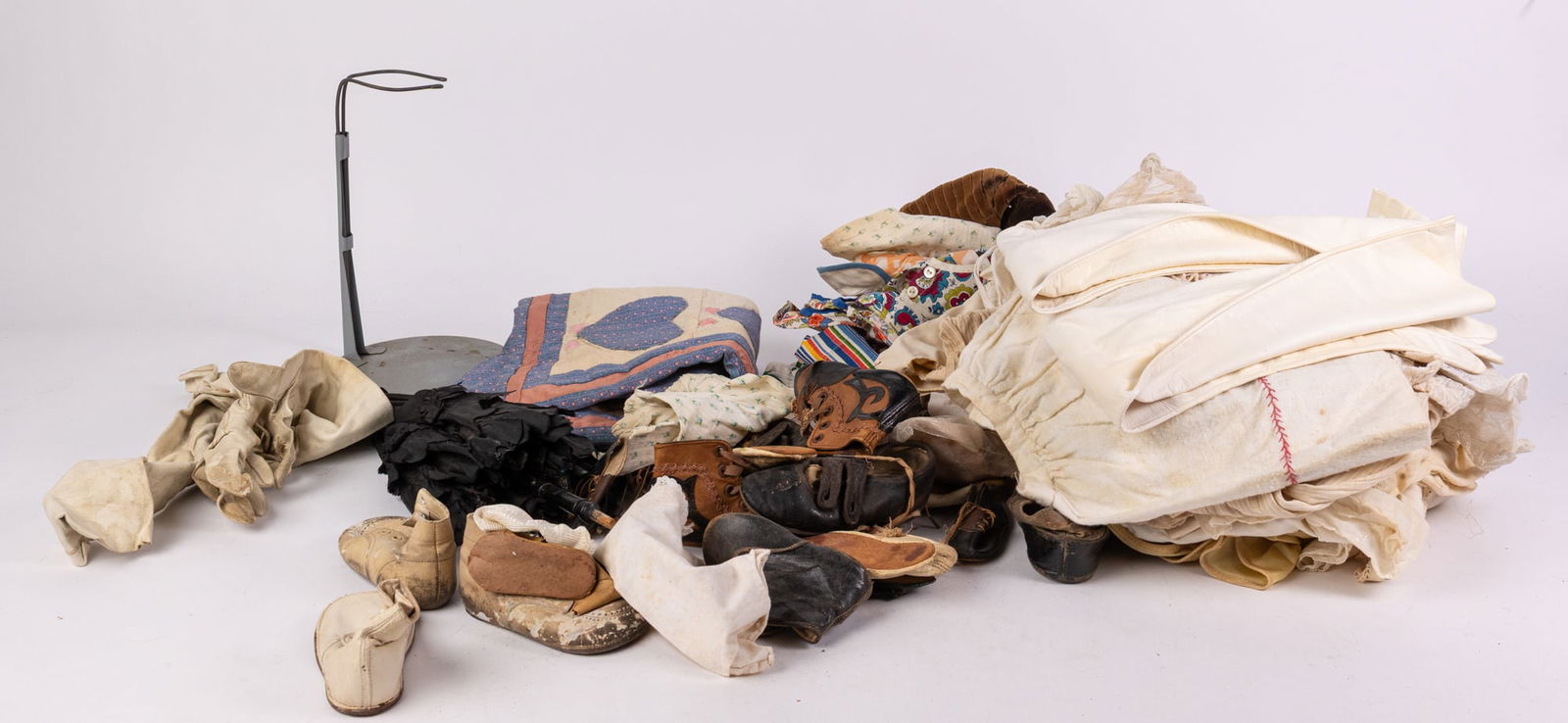 Lot of Antique and Vintage Doll Clothes/Shoes: Lot of Antique and Vintage Doll Clothes/Shoes Size 7" x 12" x 12" Literature Brooks Auction is not responsible for outbids. Questions? Call the office at (856) 694-2960 or email us directly at info@