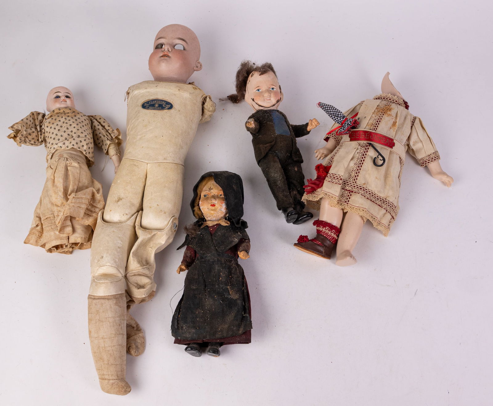 Antique Late 19th/Early 20th Century Bisque Dolls: Antique Late 19th/Early 20th Century Bisque Dolls Literature Brooks Auction is not responsible for outbids. Questions? Call the office at (856) 694-2960 or email us directly at info@brooks.auction. &