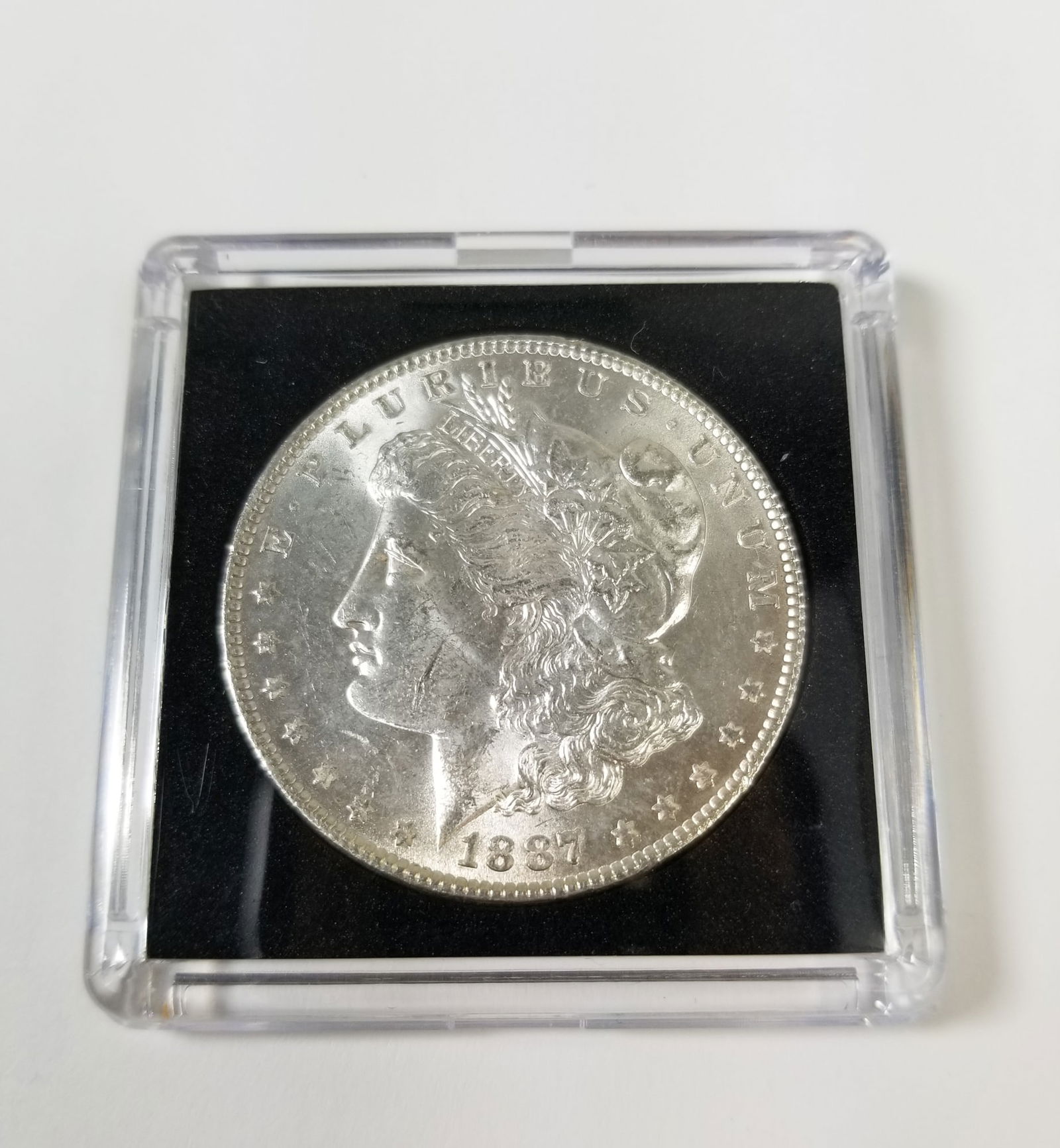 1887 Morgan Silver Dollar (1 of 2)