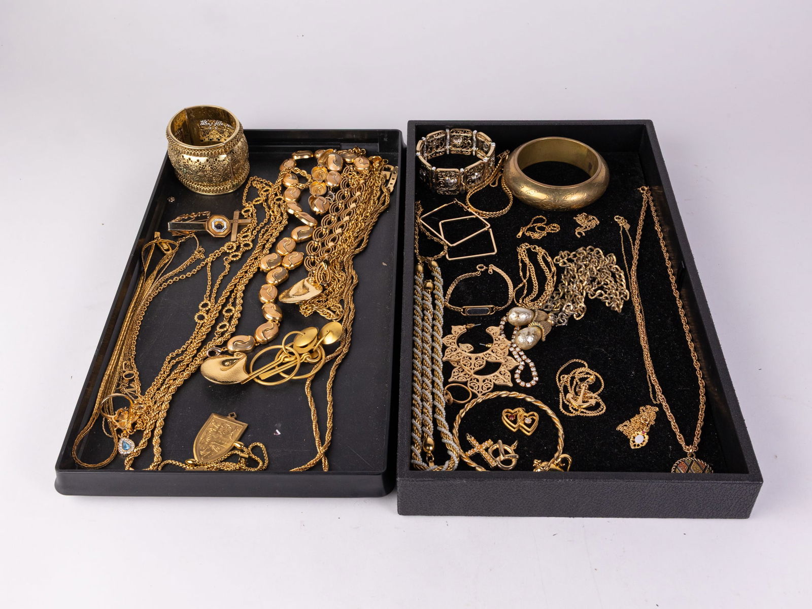 Gold Toned Vintage Costume Jewelry: Gold Toned Vintage Costume Jewelry, brands including: Trifari - Monet - Sarah Cov. - Avon - and more Literature Brooks Auction – Online Auction Terms & Conditions ————