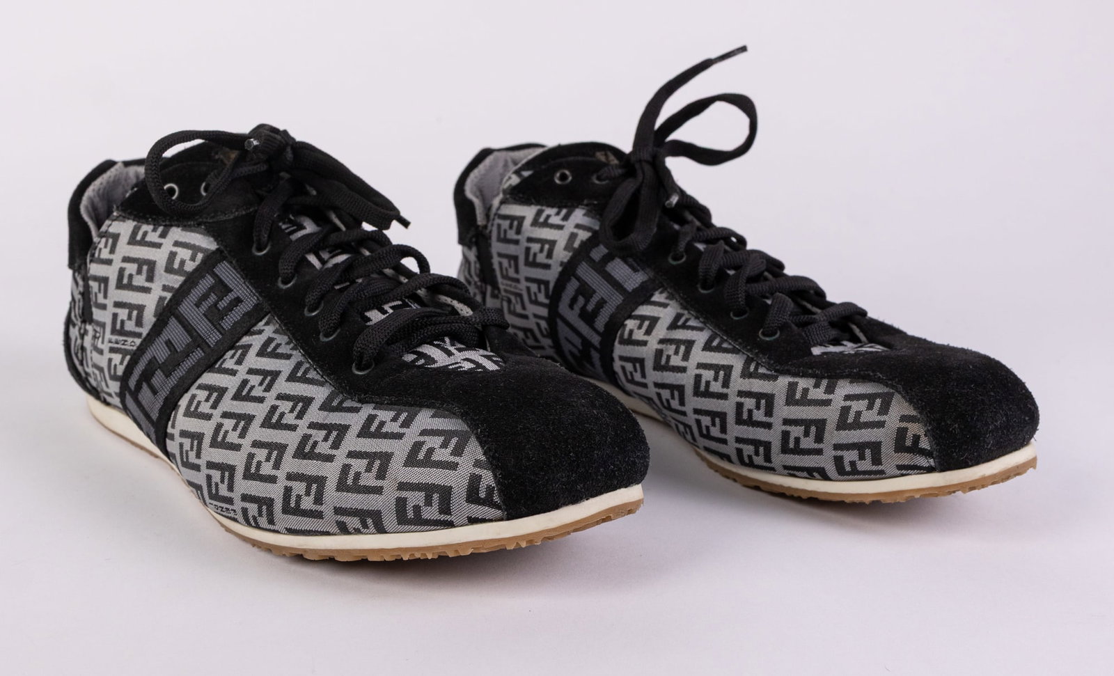 Fendi | Black "Zucca" FF Monogram Canvas & Suede Low-Top Sneakers: Made in Italy Size 43 M Literature BROOKS AUCTION WILL RE-OPEN JANUARY 5TH FOR PREVIEW All Inquiries will be adressed when we returnQuestions? Call the office at (856) 694-2960 or email us directly