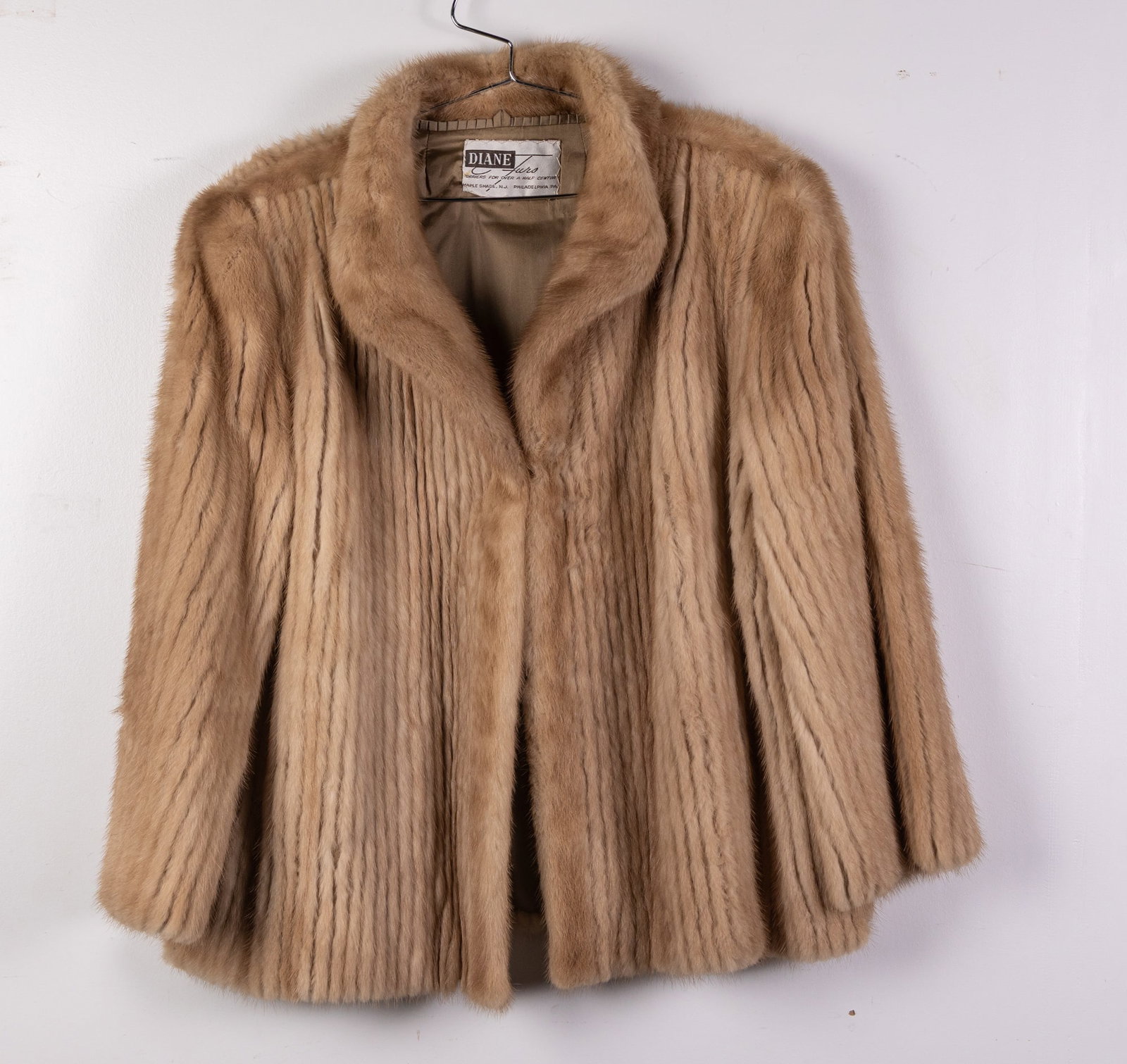 Diane Furs Ribbed Jacket: Rita E. is embroidered on the coat interior. Incredibly minor discoloration to interior lining (one small spot, about the size of a pea). There is a rip in the interior left arm pit lining only and a 