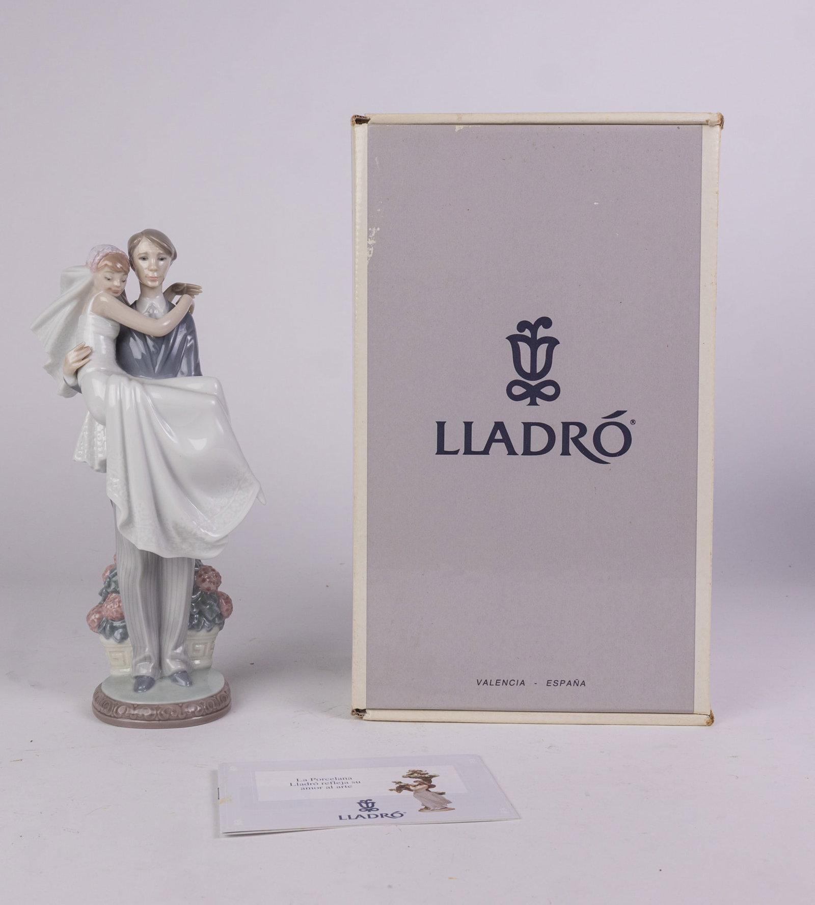 Lladro "Over the Threshold" Porcelain Collectible Figurine: Lladro "Over the Threshold" Porcelain Collectible Figurine Literature Brooks Auction – Online Auction Terms & Conditions ——————————