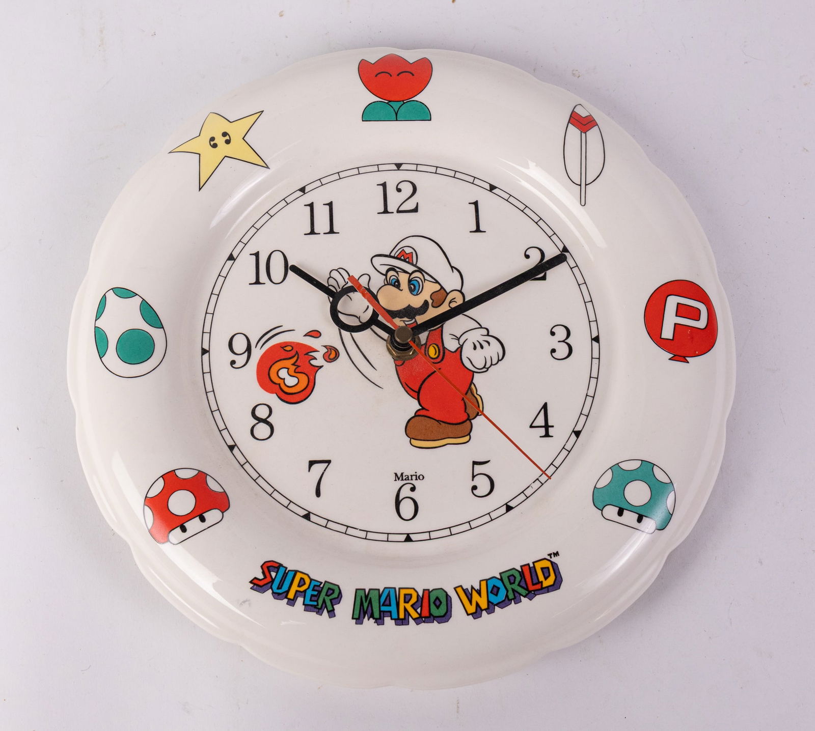 RARE 1993 Super Mario World Musical Ceramic Wall Clock: RARE 1993 Super Mario World Musical Ceramic Wall Clock: audio battery storage needs to be replaced. Tested with AA battery, clock ticks Size 10.5" x 10.5" Literature Brooks Auction is not responsible