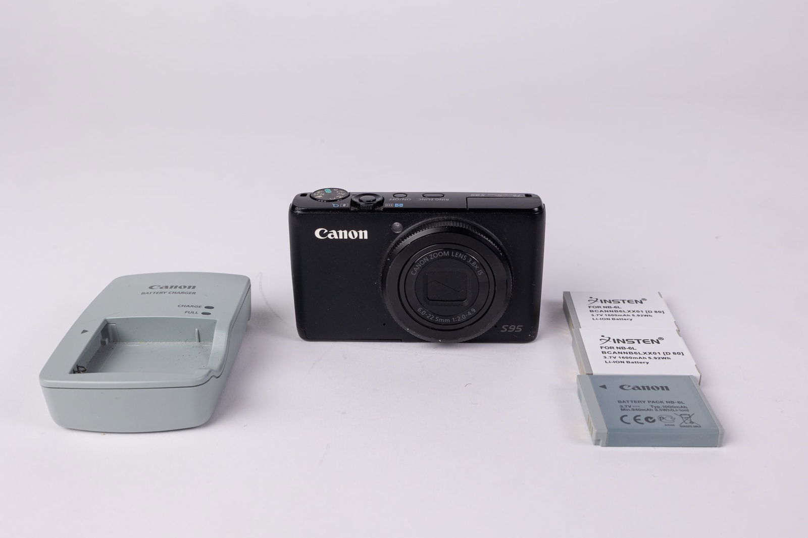 Canon S95: The Canon S95 is revered by photo enthusiasts around the world. This little camera is a God-tier CCD sensor monster that can fit in your pocket. The camera is in good working condition. There is some