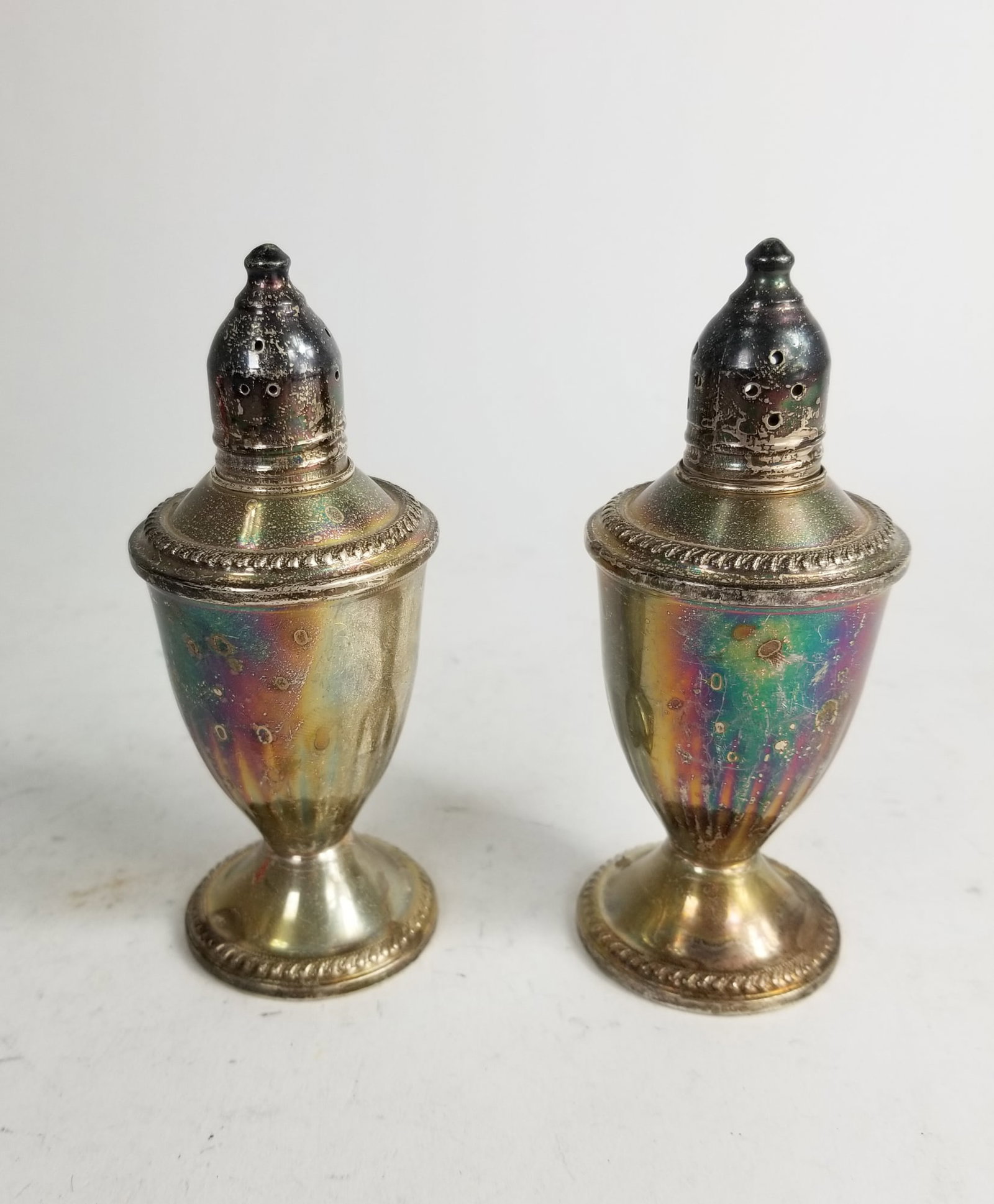 Pair of Crosby Sterling Silver Weighted Shakers: Pair of Crosby Sterling Silver Weighted Shakers, marked Crosby Sterling Weighted, total weight 277.8 gramsSize5" HLiterature Brooks Auction is not responsible for outbids. Questions? Call the office