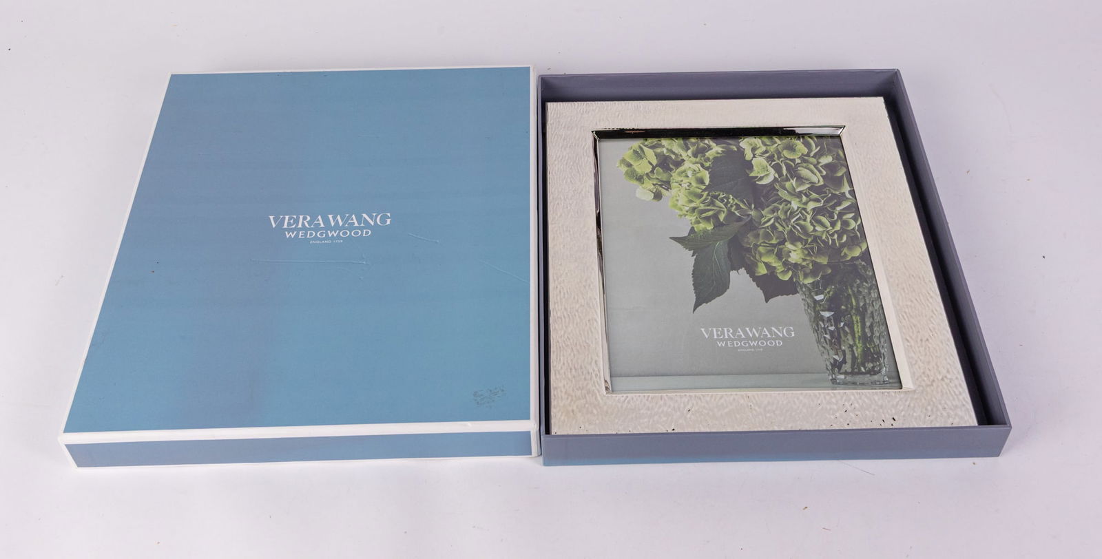 Vera Wang Wedgwood Hammered Photo Frame: Vera Wang Wedgwood Hammered Photo FrameLiterature Brooks Auction is not responsible for outbids. Questions? Call the office at (856) 694-2960 or email us directly at info@brooks.auction. •