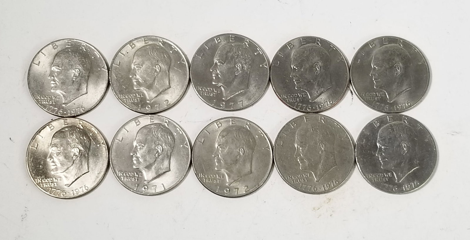 Ten Eisenhower Dollars: (10) Eisenhower Dollars: 1971 - 1972 - 1972D - (4) 1976 - (2) 1976D - 1977Literature Brooks Auction is not responsible for outbids. Questions? Call the office at (856) 694-2960 or email us directly