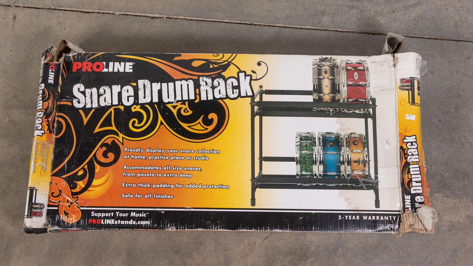 ProLine Snare Drum Rack in Box: ProLine Snare Drum Rack in Box, box has been opened. Unknown if all necessary parts present.Size33" x 17" x 4"LiteratureBrooks Auction – Online Auction Terms & Conditions