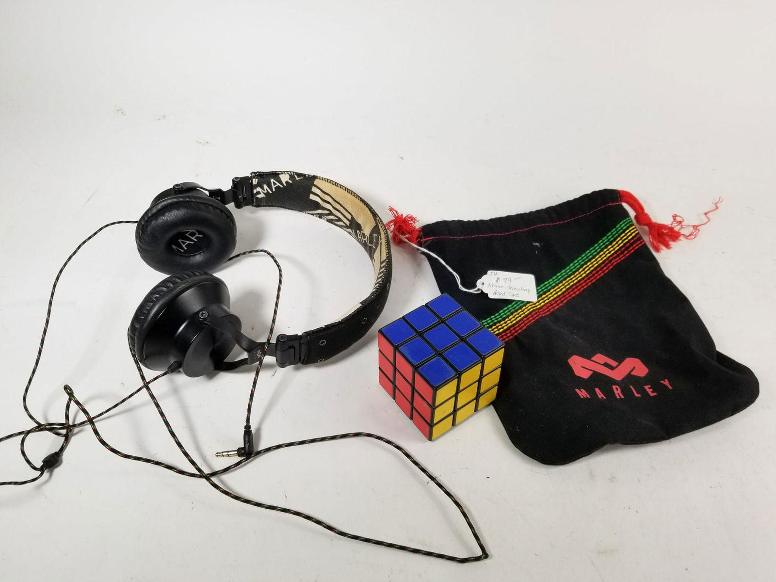 Marley Noise Cancelling Headphones: Marley Noise Cancelling Headphones, untestedSize7" x 12" x 12" (box size)LiteratureBrooks Auction – Online Auction Terms & Conditions