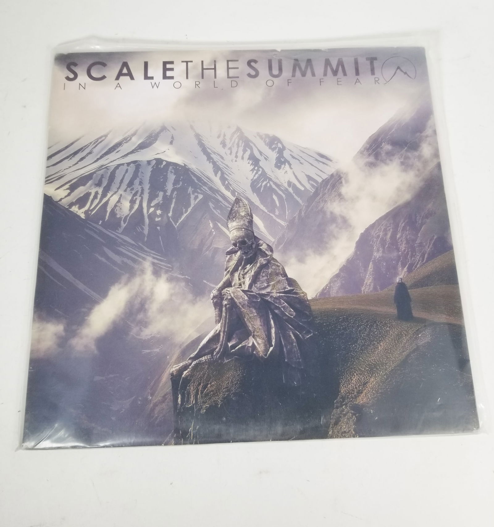 Scale The Summit - In A World Of Fear [Ltd Ed of 250/Yellow & Black Splatter Vinyl]: Scale The Summit - In A World Of Fear [Ltd Ed of 250/Yellow & Black Splatter Vinyl]Size12" x 12"LiteratureBrooks Auction – Online Auction Terms & Conditions