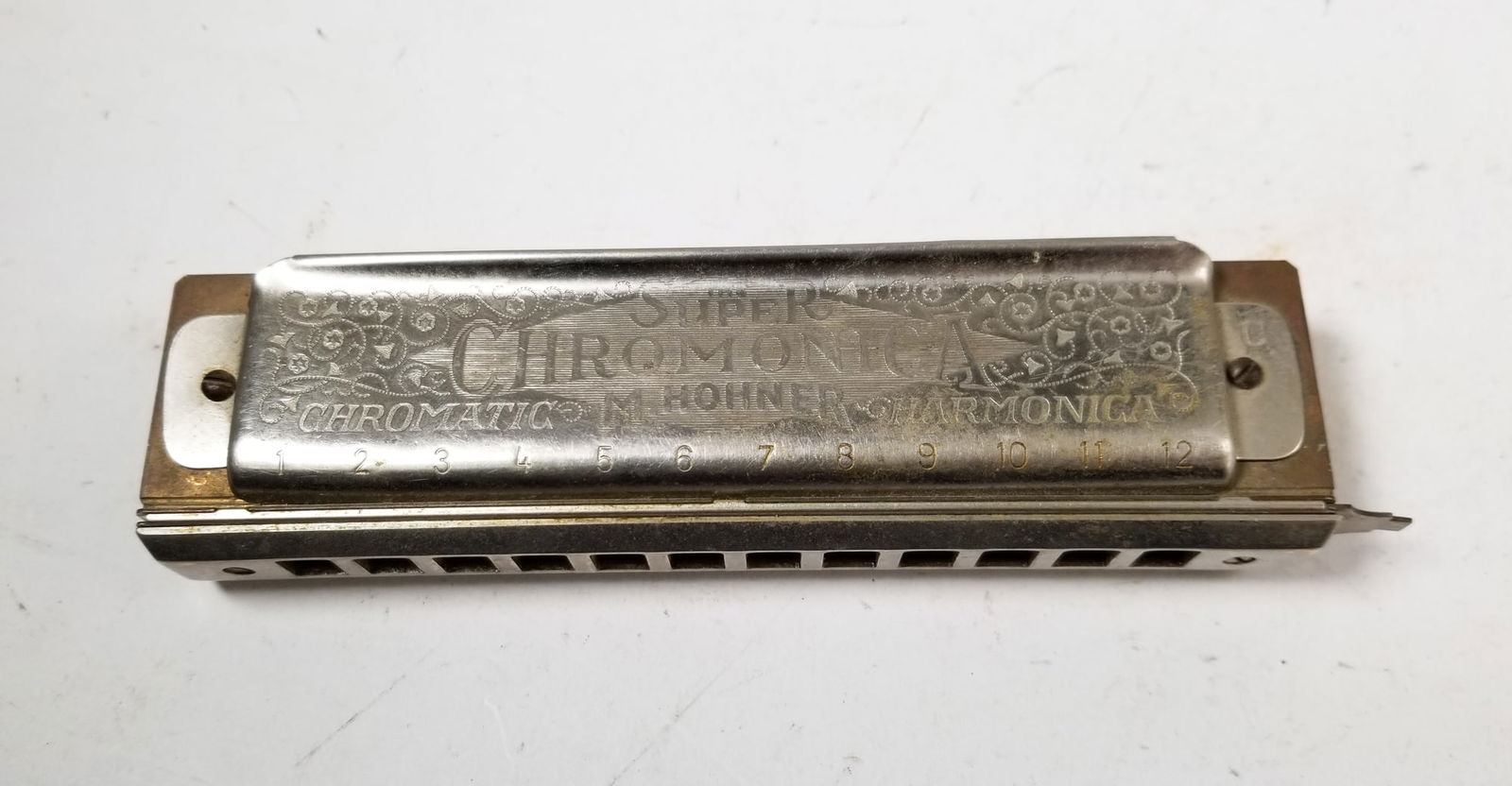 Hohner Super Chromonica Harmonica: Hohner Super Chromonica HarmonicaSize6"LiteratureBrooks Auction – Online Auction Terms & Conditions