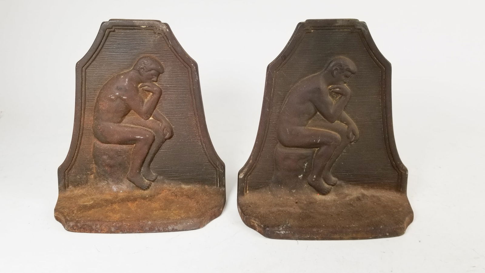 Pair of Cast Iron "The Thinker" Bookends: Pair of Cast Iron "The Thinker" BookendsSize6" HLiteratureBrooks Auction – Online Auction Terms & Conditions