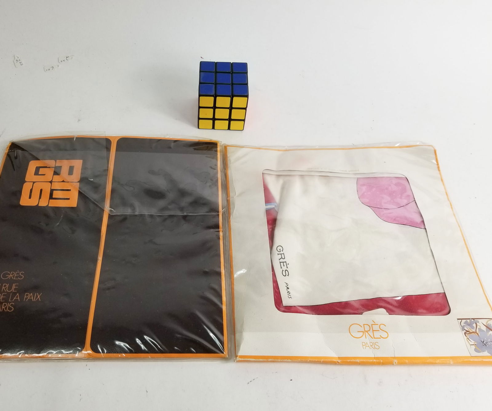 Two Gres Paris Scarves in Original Packaging: Two Gres Paris Scarves in Original PackagingSize7" x 12" x 12"LiteratureBrooks Auction – Online Auction Terms & Conditions