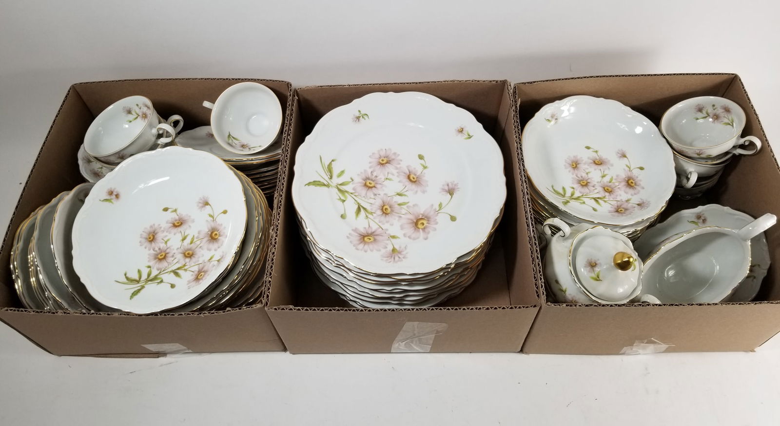 Mitterteich Bavaria "Daisy Bell" Porcelain Dish Set: Mitterteich Bavaria "Daisy Bell" Porcelain Dish SetSize7" x 12" x 12"LiteratureBrooks Auction – Online Auction Terms & Conditions