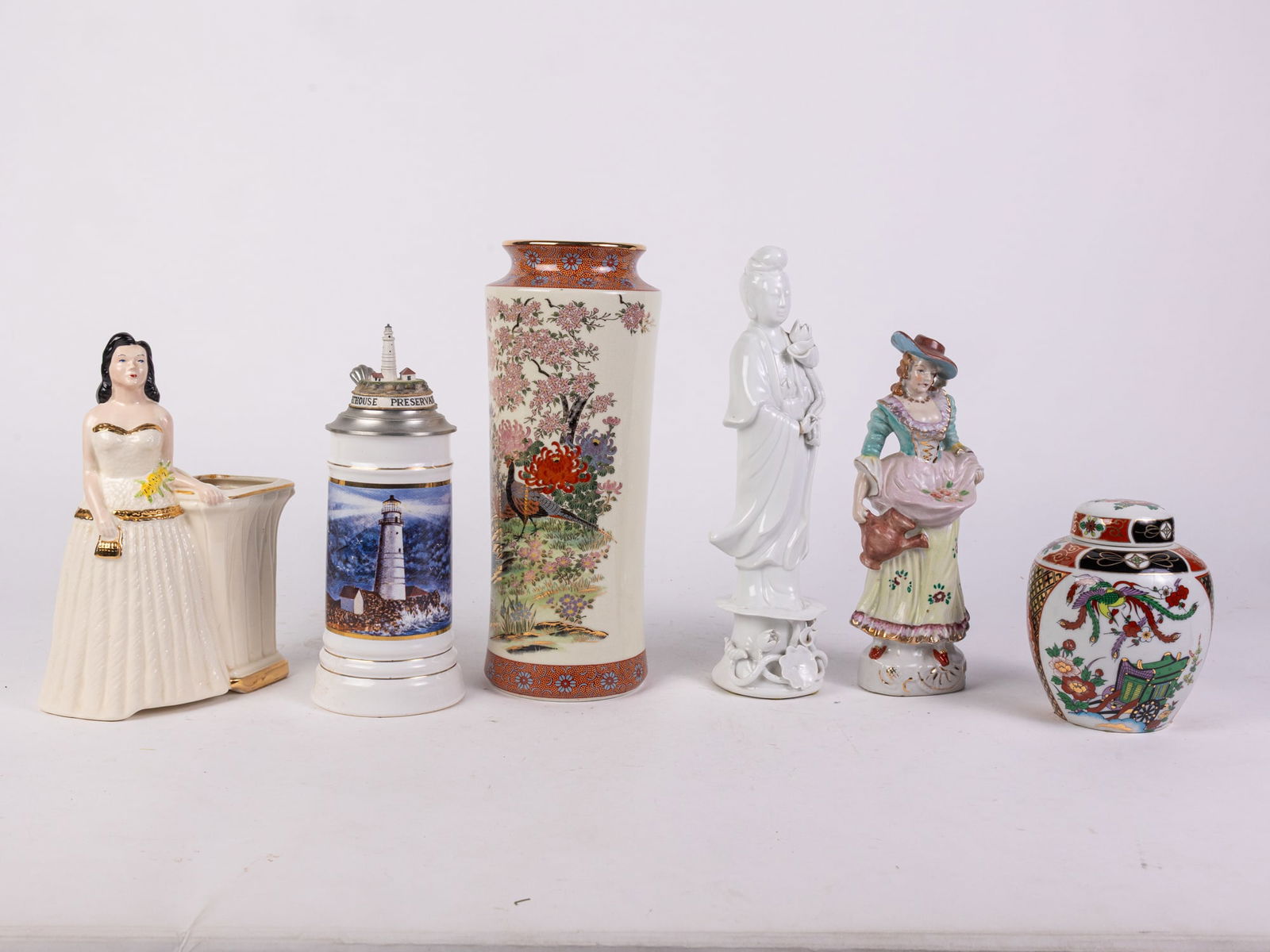 Porcelain & Ceramics Assortment ft. Occupied Japan: Porcelain & Ceramics Assortment ft. Occupied JapanSize7" x 12" x 12"LiteratureBrooks Auction – Online Auction Terms & Conditions