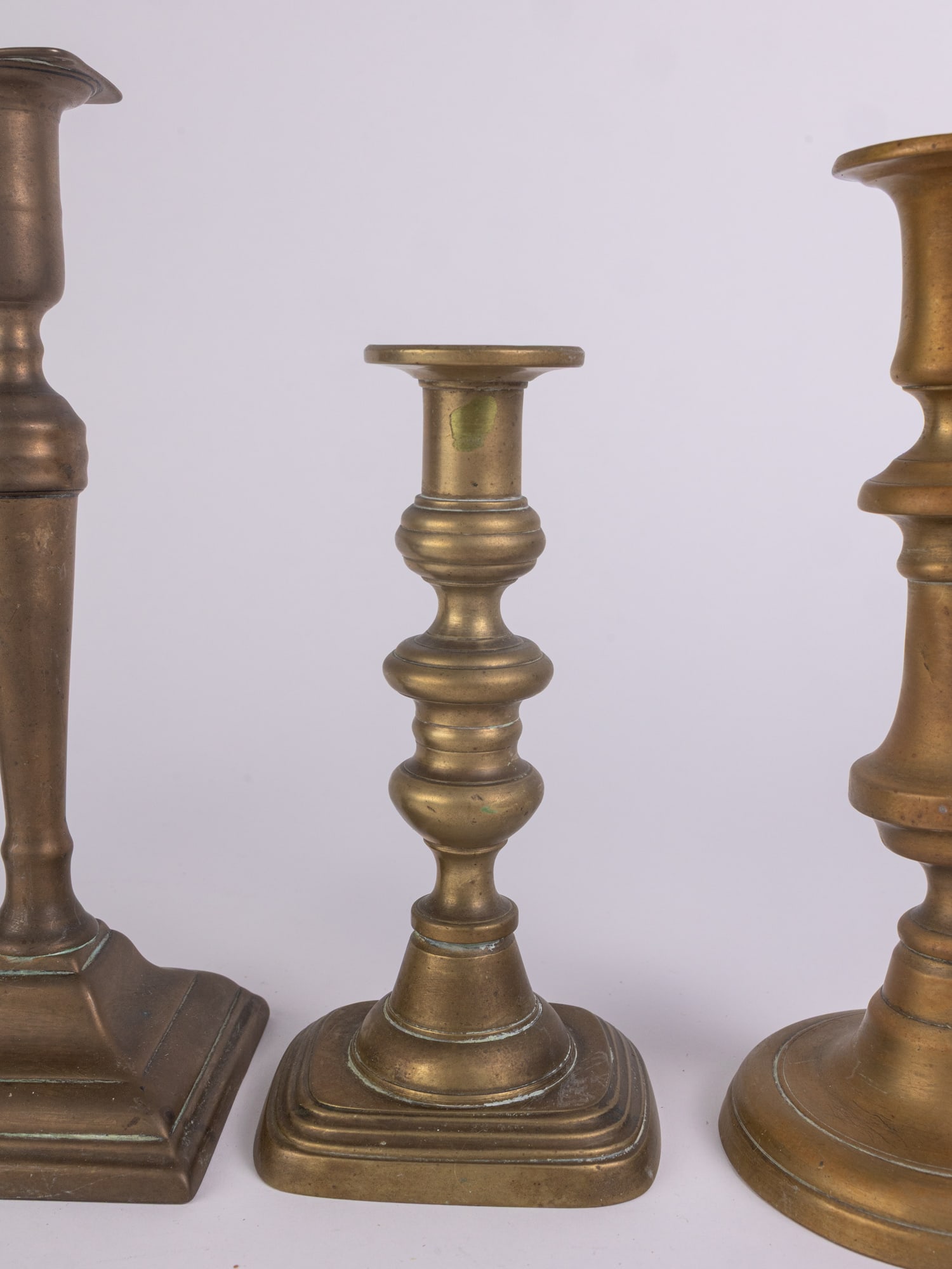 Four Antique Brass Candlestick Holders - 4