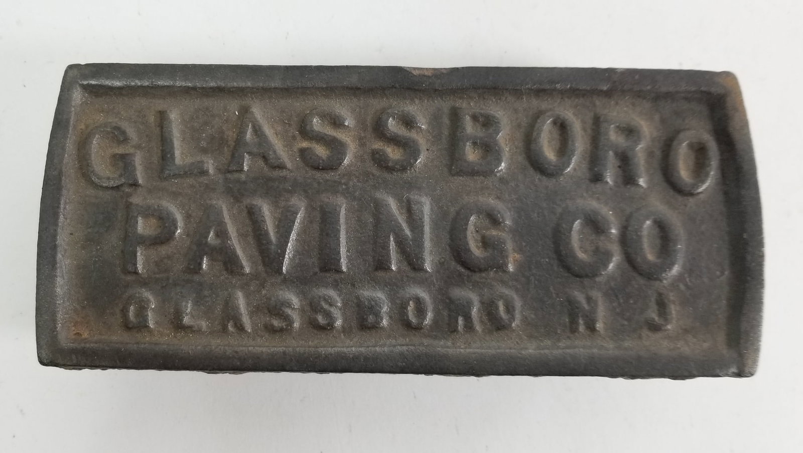 Antique "Glassboro Paving Co" Cast Iron Advertising Placard: Antique "Glassboro Paving Co" Cast Iron Advertising Placard Size 6" x 3" x 1.5" Literature Brooks Auction – Online Auction Terms & Conditions ———————