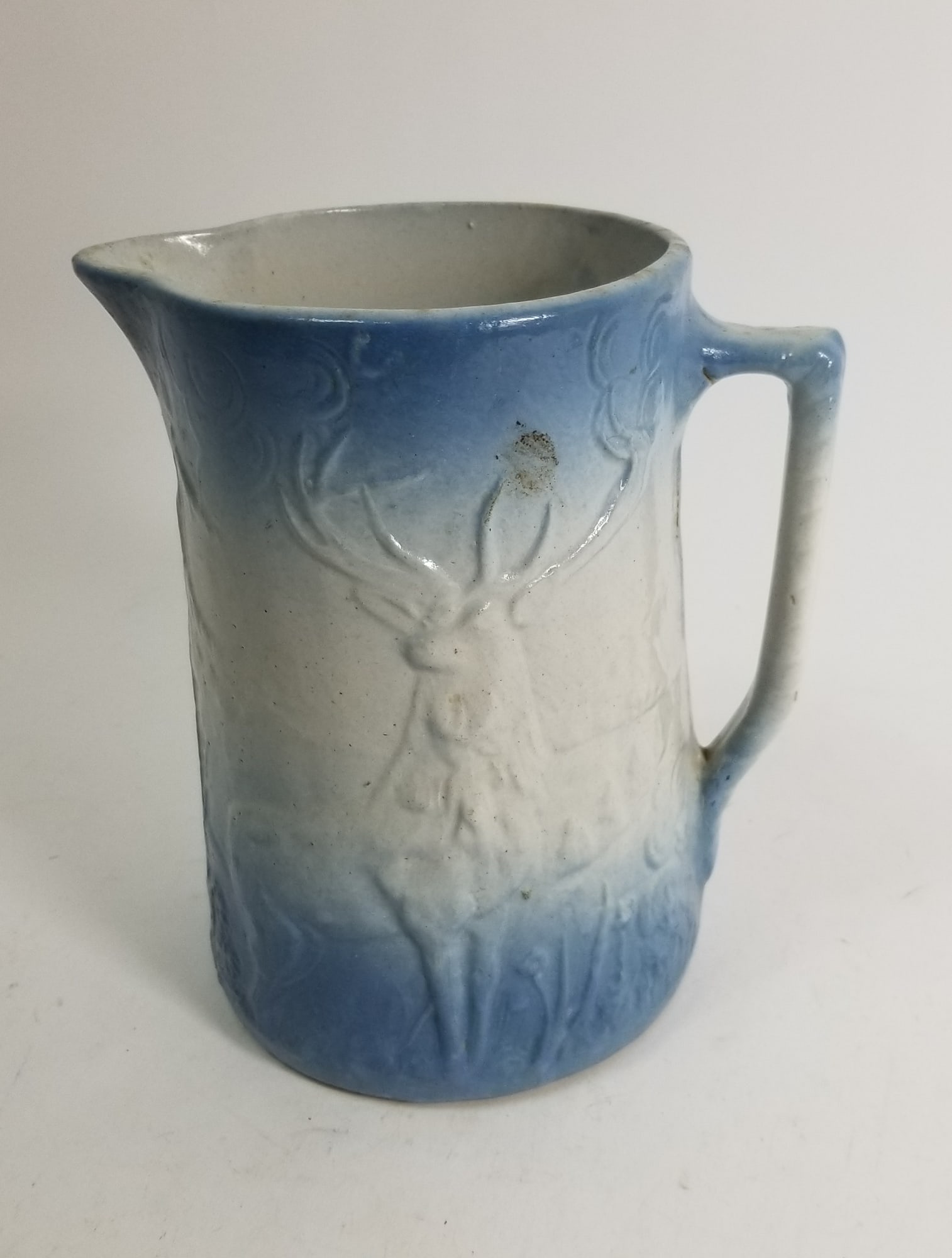 Antique Salt Glazed Stoneware Pitcher w/ Stag Motif: Antique Salt Glazed Stoneware Pitcher w/ Stag MotifSize8.5" HLiteratureBrooks Auction – Online Auction Terms & Conditions