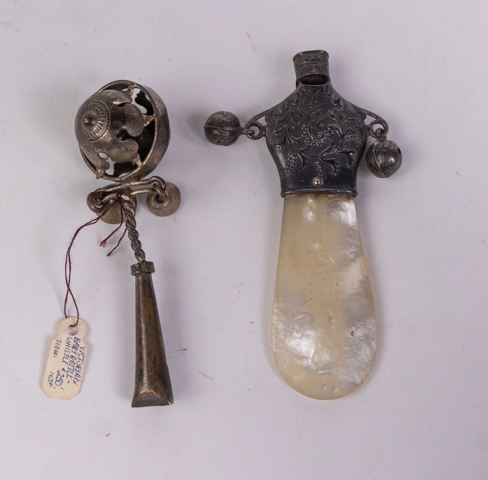 Antique Early Pair of Victorian Baby Rattle Whistles: Antique Early Pair of Victorian Baby Rattle Whistles Size 4" H Literature Brooks Auction – Online Auction Terms & Conditions Contact: (856) 694-2960 | info@brooks.auction READ BEFORE YOU BID