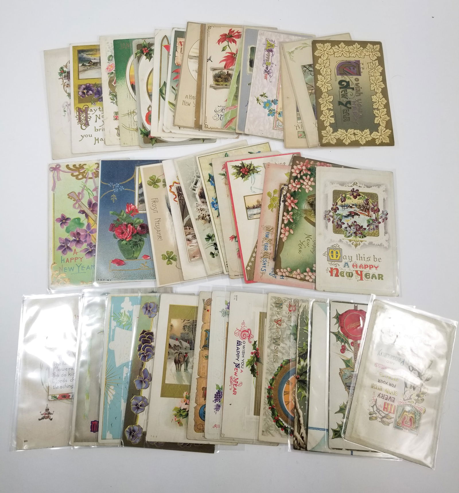 Grouping of Antique New Year Postcards (1 of 1)