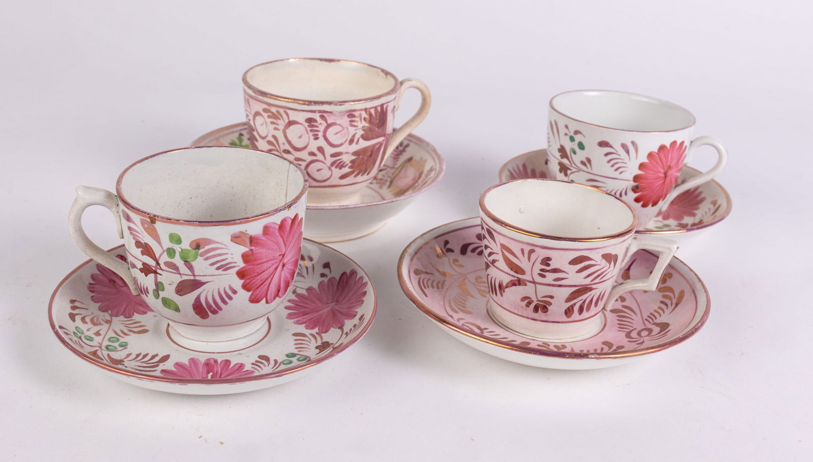 Grouping of Antique Early Sunderland Attr Pink Luster Cups & Saucers: Grouping of Antique Early Sunderland Attr Pink Luster Cups & Saucers Size 7" x 12" x 12" Literature Brooks Auction – Online Auction Terms & Conditions Contact: (856) 694-2960 | info@brooks.auct