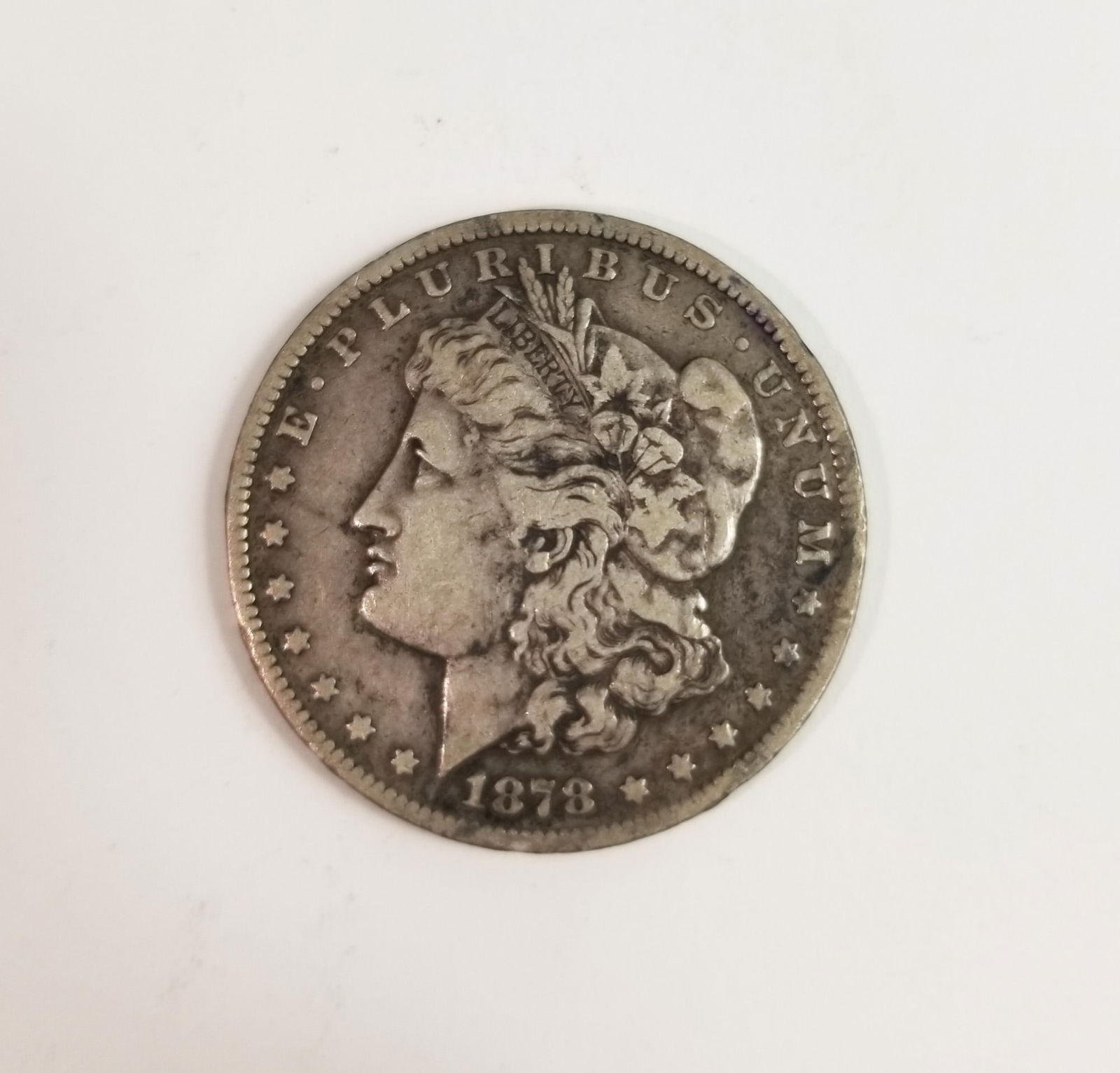 1878 Morgan Silver Dollar: 1878 Morgan Dollar *CC* 90% SilverLiteratureBrooks Auction – Online Auction Terms & Conditions Contact: (856) 694-2960 | info@brooks.auction READ BEFORE YOU BID: We want you to feel confident