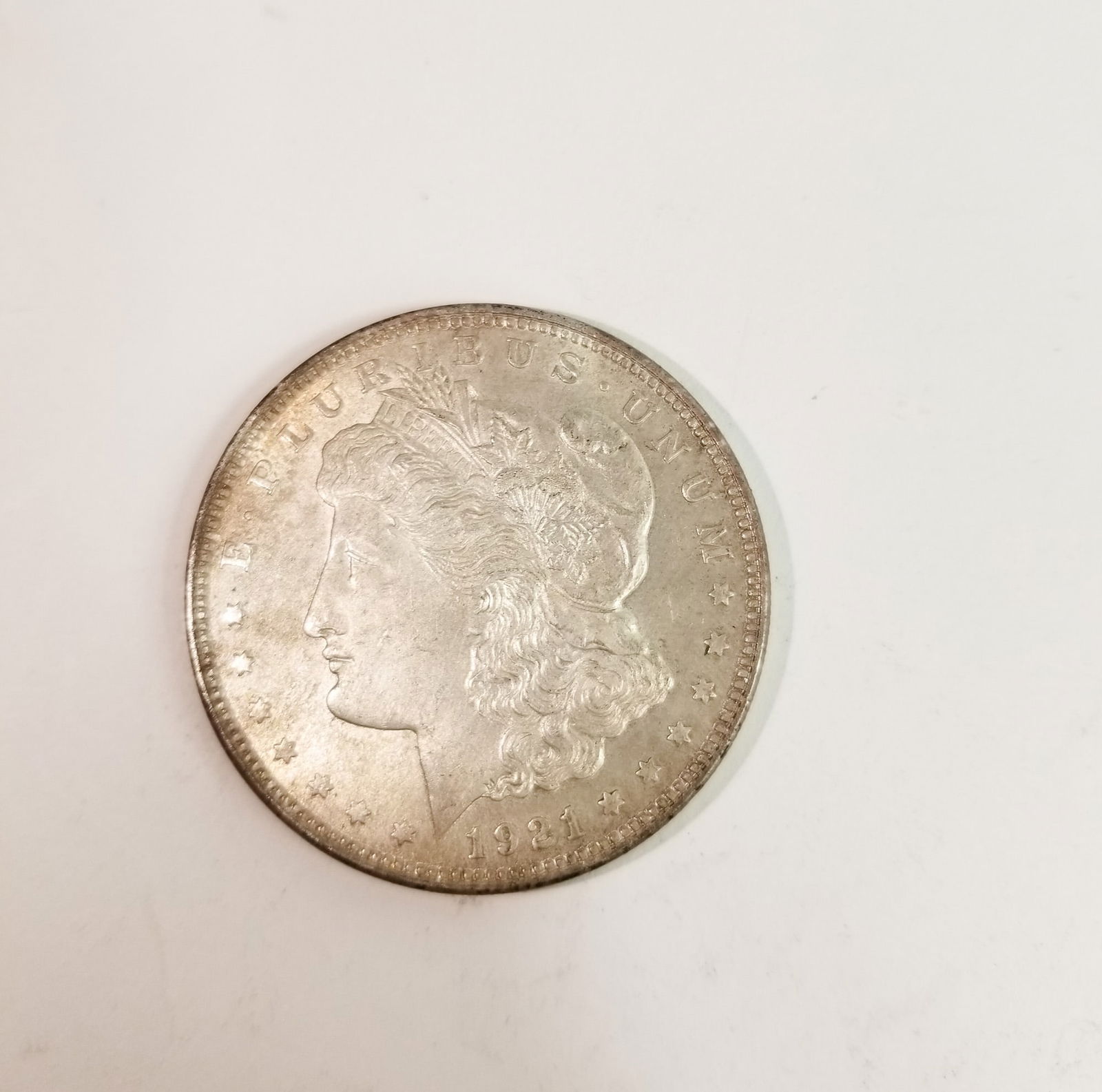 1921 Morgan Silver Dollar: 1921 Morgan Dollar *P* 90% Silver Literature Brooks Auction – Online Auction Terms & Conditions Contact: (856) 694-2960 | info@brooks.auction READ BEFORE YOU BID: We want you to feel confident w