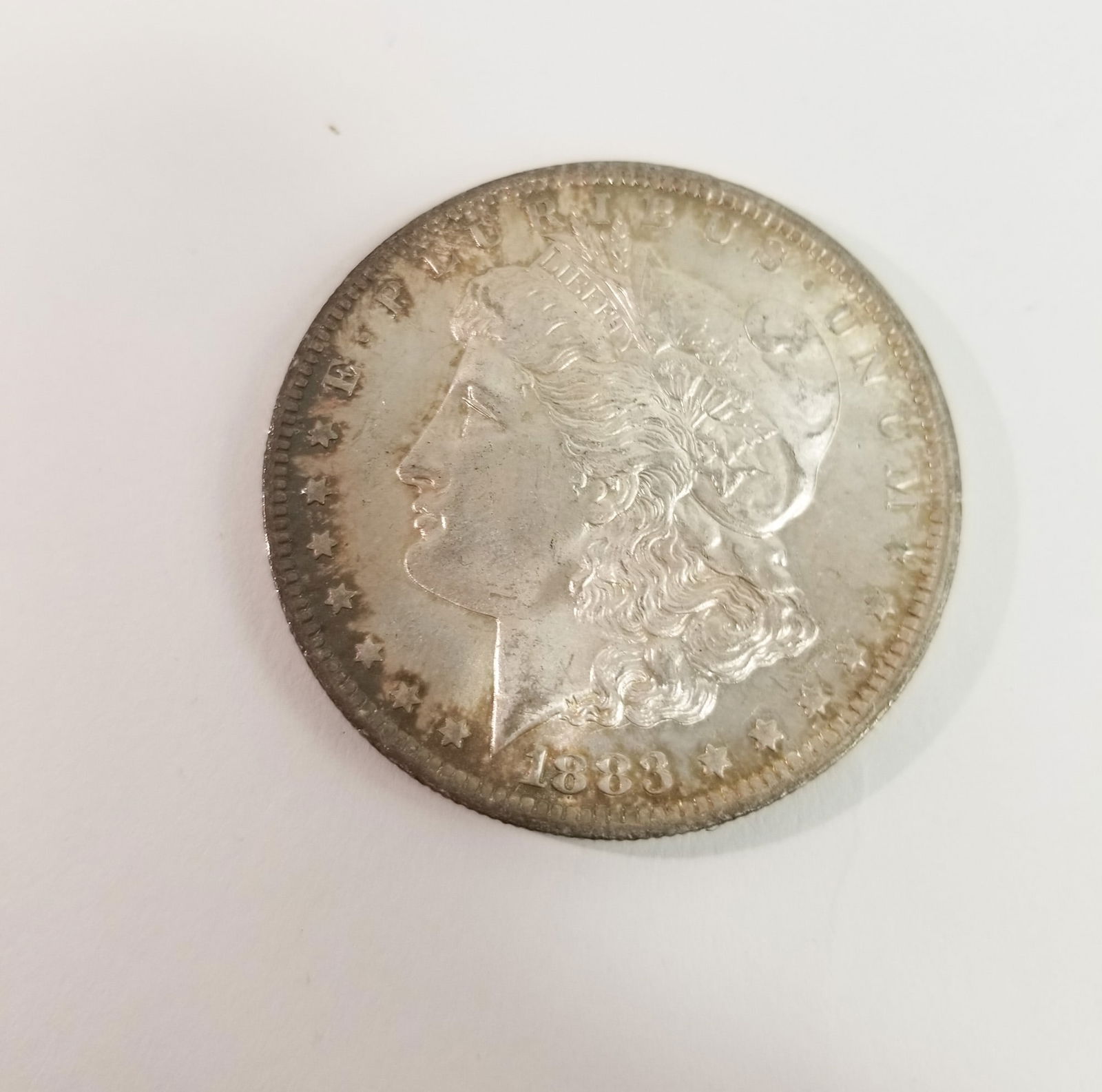 1883 Morgan Silver Dollar: 1883 Morgan Dollar *O* 90% SilverLiteratureBrooks Auction – Online Auction Terms & Conditions Contact: (856) 694-2960 | info@brooks.auction READ BEFORE YOU BID: We want you to feel confident