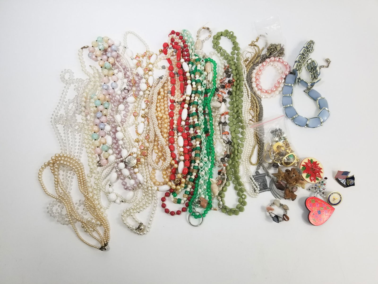 Assorted Costume Jewelry: Necklaces, Pins, Pendants, and earings *Over 2 Pounds!*LiteratureBrooks Auction – Online Auction Terms & Conditions Contact: (856) 694-2960 | info@brooks.auction READ BEFORE YOU BID: We want
