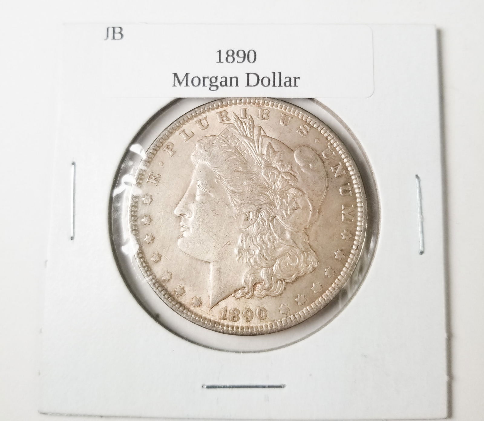 1890 Morgan Silver Dollar: 1890 Morgan Dollar *P* 90% SilverLiteratureBrooks Auction – Online Auction Terms & Conditions Contact: (856) 694-2960 | info@brooks.auction READ BEFORE YOU BID: We want you to feel confident