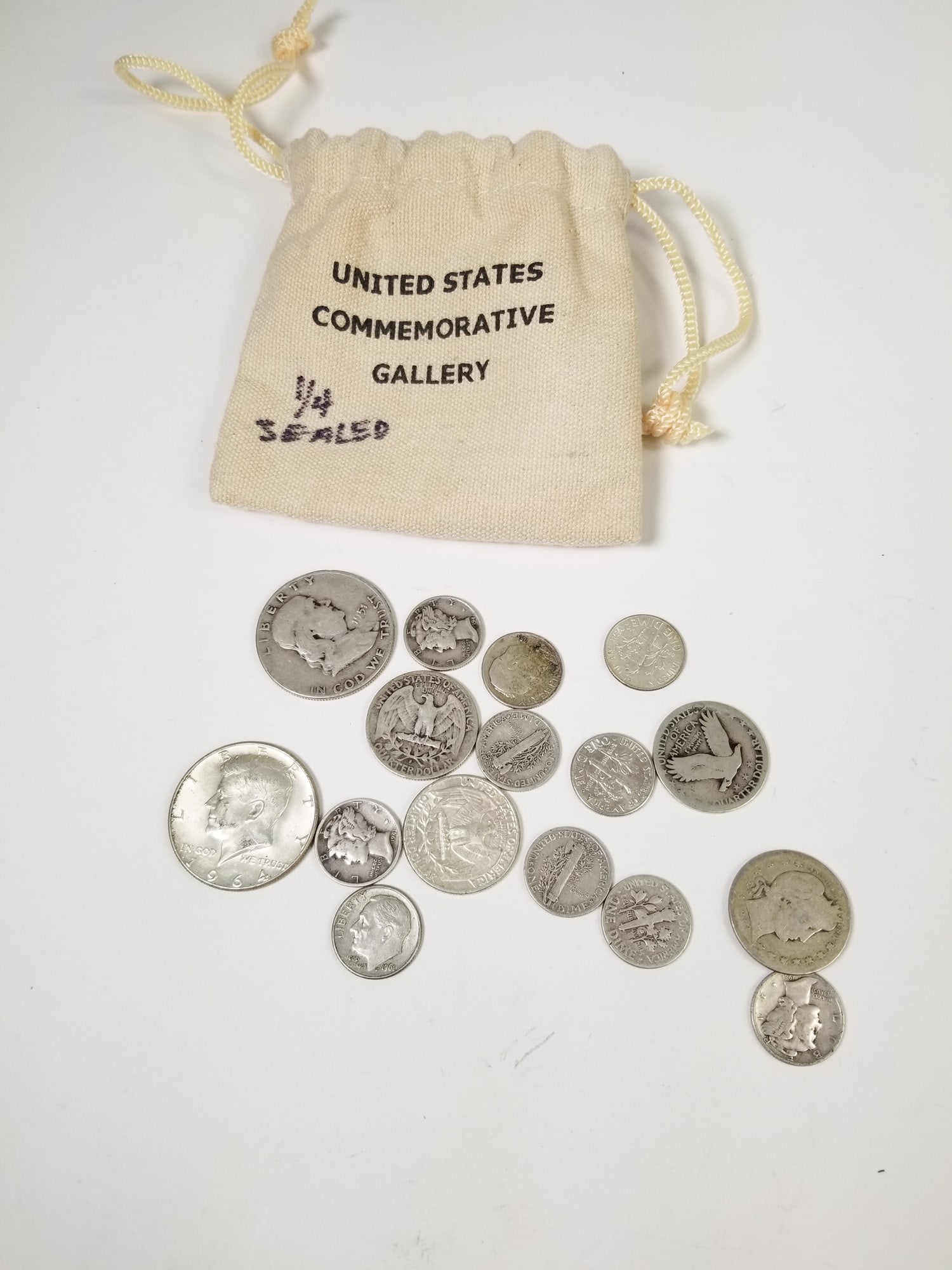 Assorted Silver US Coins: Assorted Silver US CoinsLiteratureBrooks Auction – Online Auction Terms & Conditions Contact: (856) 694-2960 | info@brooks.auction READ BEFORE YOU BID: We want you to feel confident when