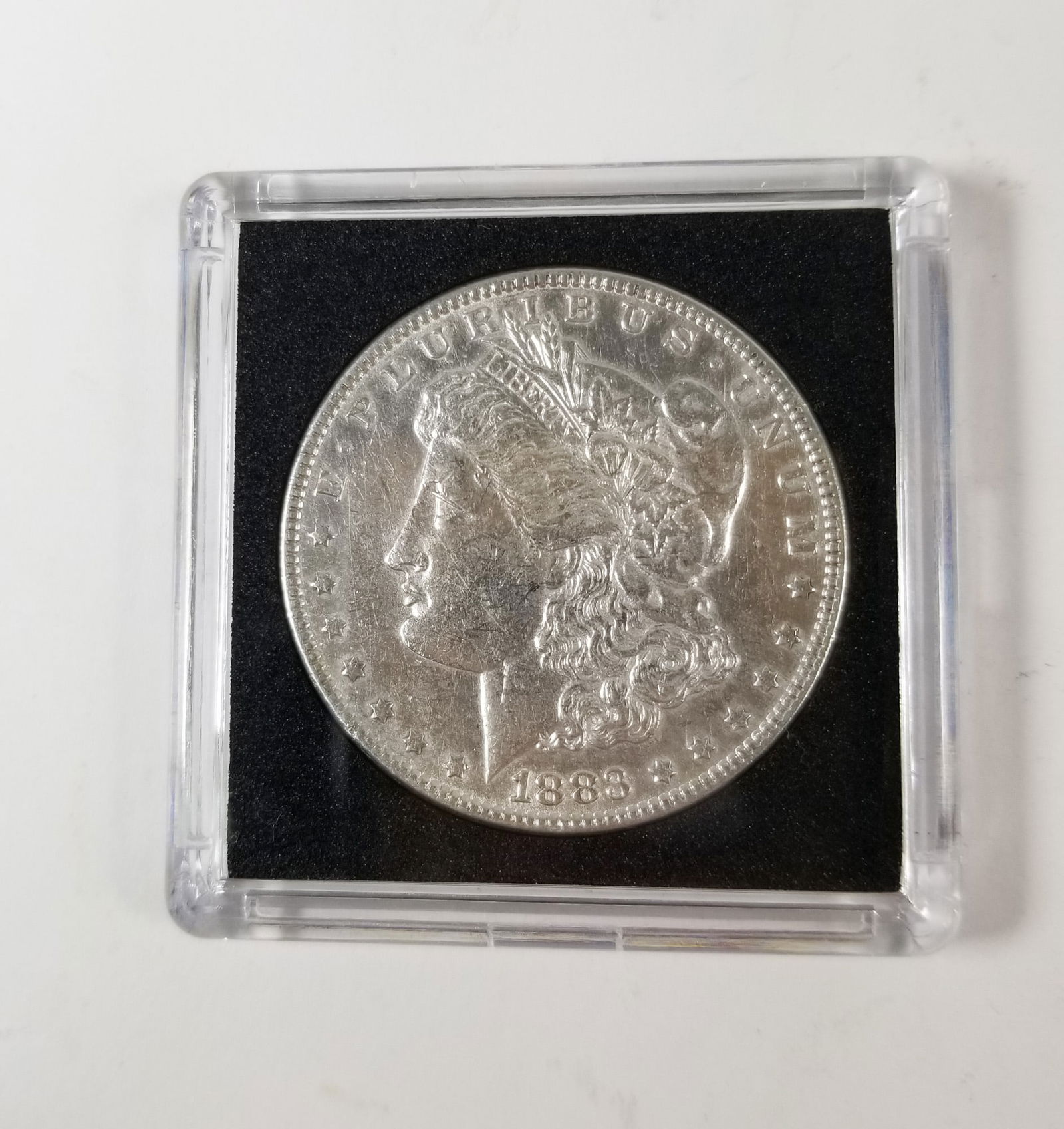 1883 Morgan Silver Dollar: 1883 Morgan Dollar *P* 90% SilverLiteratureBrooks Auction – Online Auction Terms & Conditions Contact: (856) 694-2960 | info@brooks.auction READ BEFORE YOU BID: We want you to feel confident