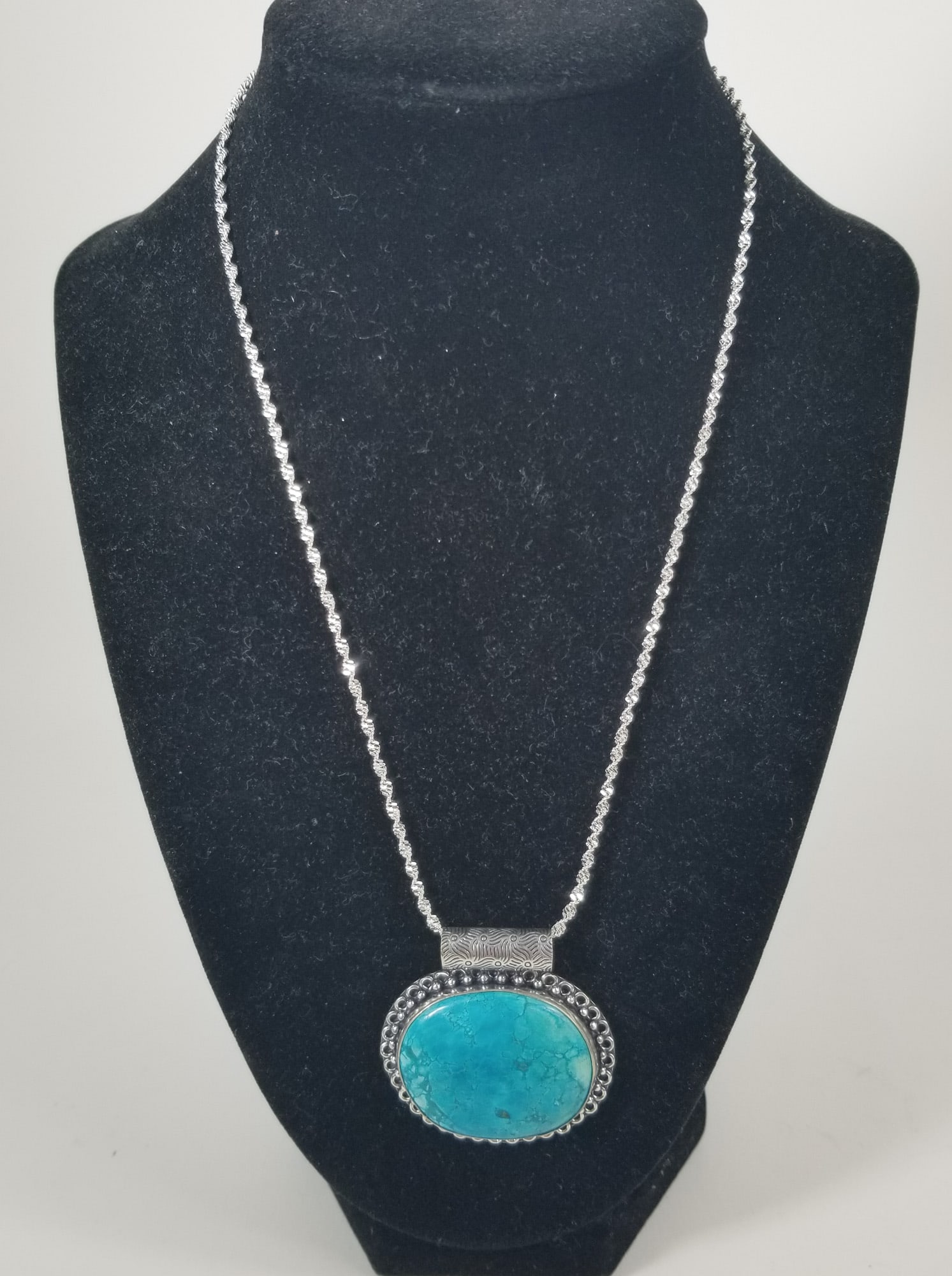 Sterling Silver and Turquoise Necklace: pendant stamped 925 on a silver rope chain turquoise stone Literature Brooks Auction – Online Auction Terms & Conditions Contact: (856) 694-2960 | info@brooks.auction READ BEFORE YOU BID: We wan