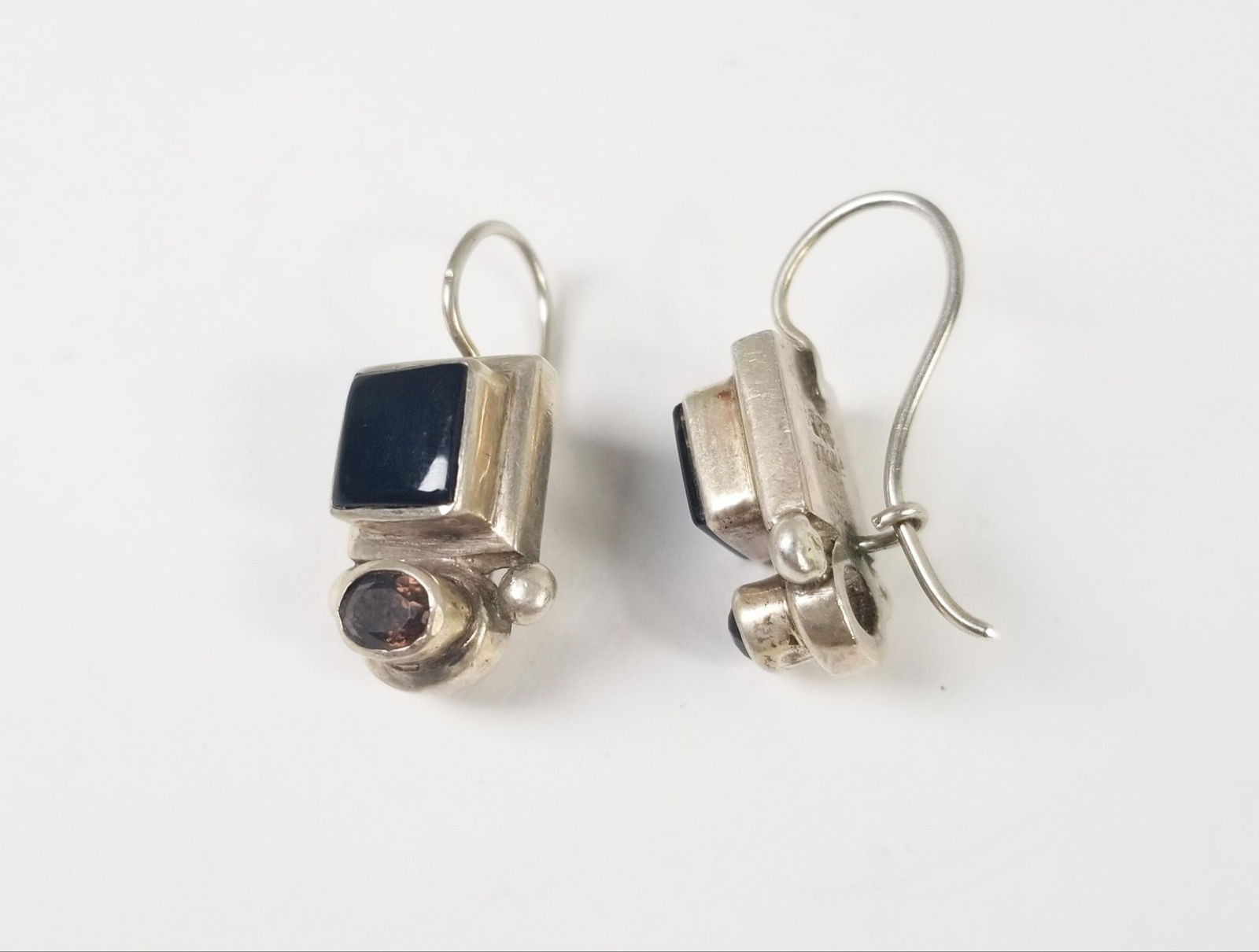 Sterling Silver and Black Stone Earrings: Stamped 925 and India Shepards hook hardwareLiteratureBrooks Auction – Online Auction Terms & Conditions Contact: (856) 694-2960 | info@brooks.auction READ BEFORE YOU BID: We want you to feel