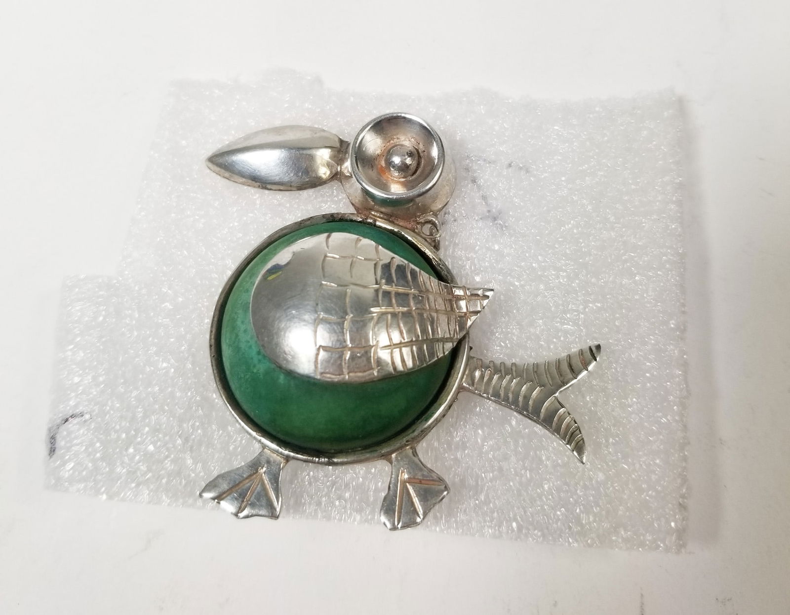 Mid 20th Century Mexican Silver Pin: Mid 20th Century Mexican Silver PinLiteratureBrooks Auction – Online Auction Terms & Conditions Contact: (856) 694-2960 | info@brooks.auction READ BEFORE YOU BID: We want you to feel confident