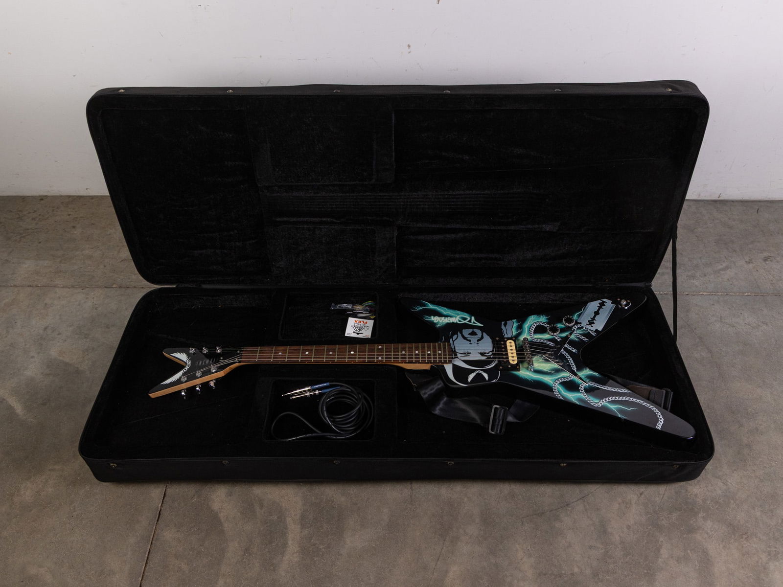 Dean Dimebag Darrell Tribute Electric Guitar: Dean Dimebag Darrell Tribute Electric Guitar, This guitar, produced by Dean in the 2000's, pays tribute to the late lead guitarist for Pantera, Dimebag Darrell. It has been tested and is in working