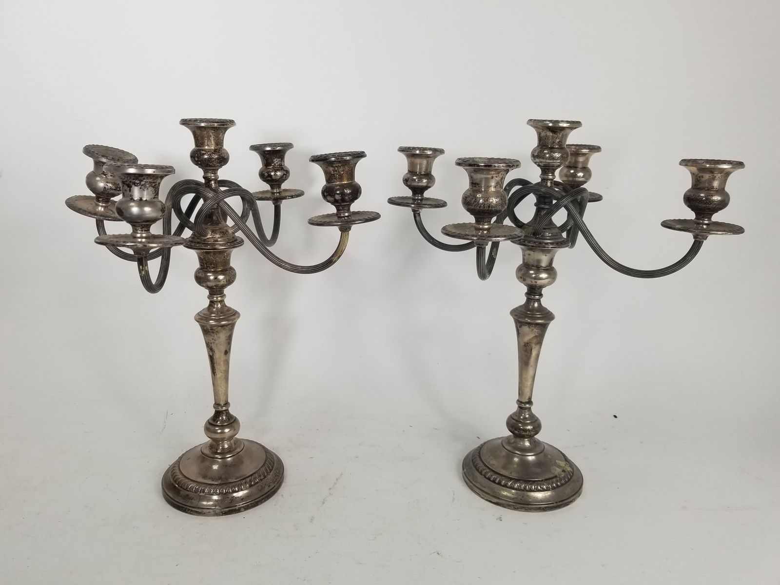 2 Frank M. Whiting & Co Sterling Silver Candle Stick Holders 6in 2pc Set: 2 Frank M. Whiting & Co Sterling Silver Candlestick Holders 5lb 5oz 2.4 KgLiteratureBrooks Auction – Online Auction Terms & Conditions Contact: (856) 694-2960 | info@brooks.auction READ BEFORE