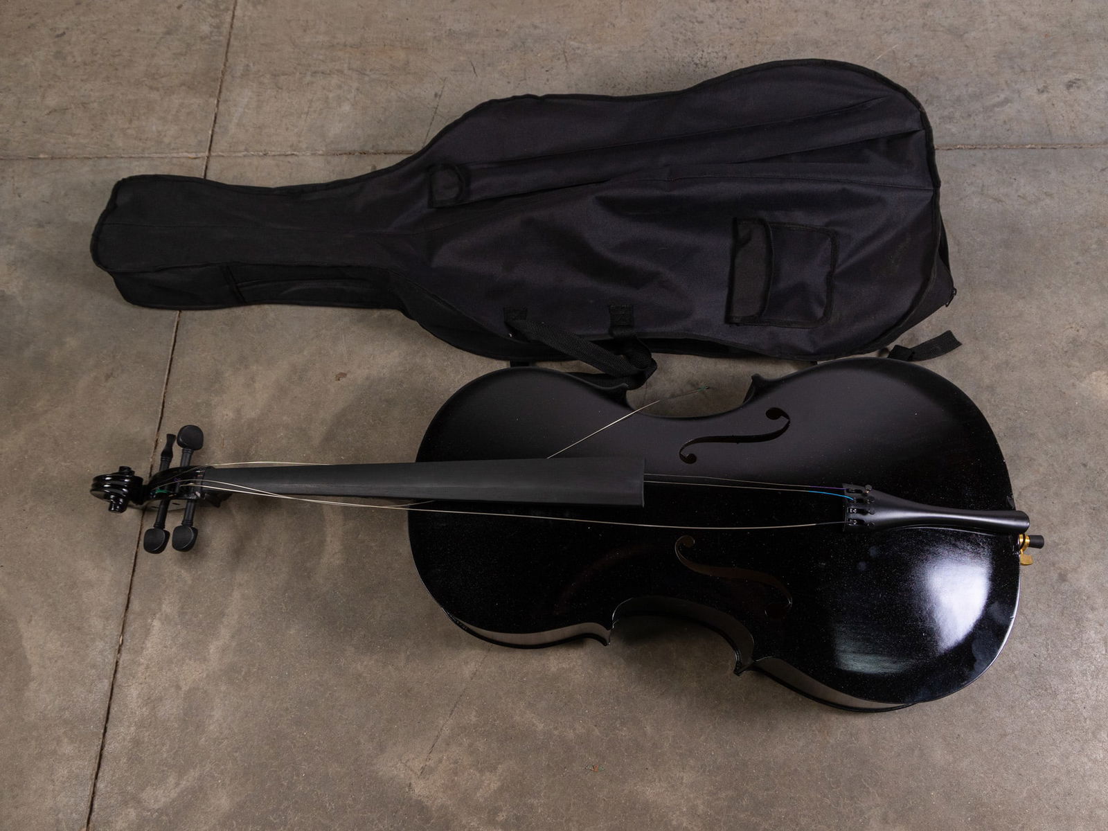 Black Cello in Soft Case: Black Cello in Soft Case, Contemporary cello painted black in soft zippered case. Includes bridge.Size51" HLiteratureBrooks Auction – Online Auction Terms & Conditions Contact: (856) 694-2960 |