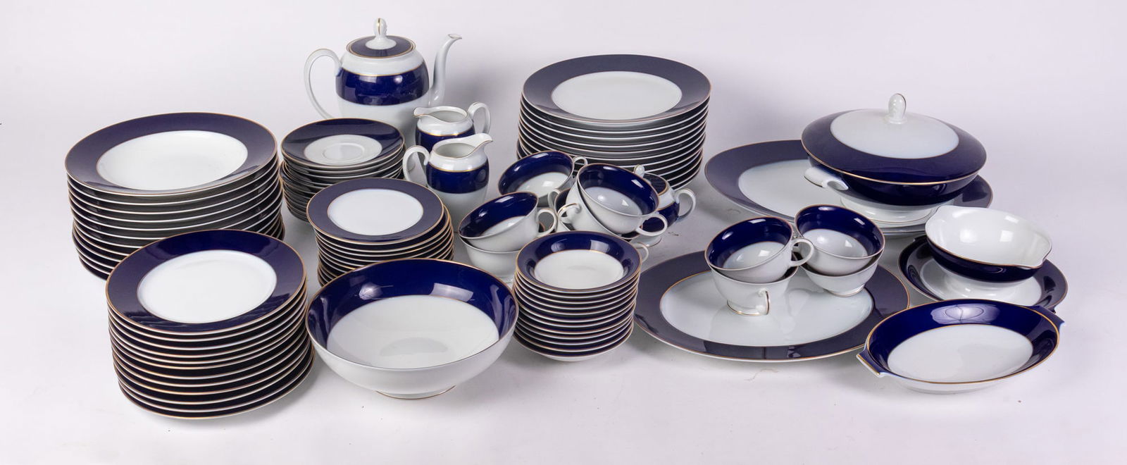 Rosenthal Cobalt Blue Porcelain Dishware Set: Rosenthal Cobalt Blue Porcelain Dishware Set Size 7" x 12" x 12" Literature Brooks Auction – Online Auction Terms & Conditions Contact: (856) 694-2960 | info@brooks.auction READ BEFORE YOU B