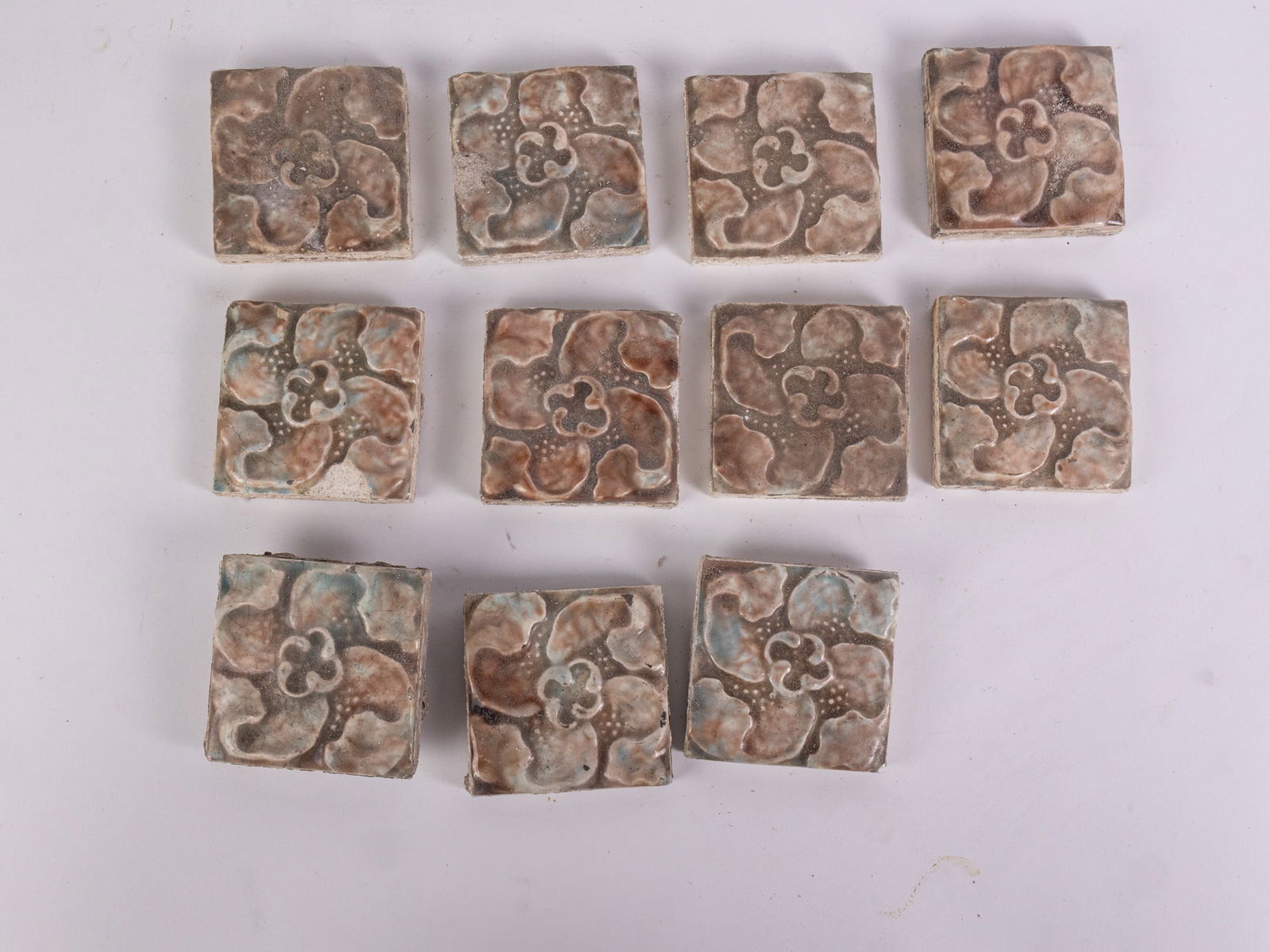 Eleven Vintage Architectural Salvage Ceramic Tiles with Dogwood/Floral Motif: Eleven Vintage Ceramic Tiles with Dogwood/Floral MotifSize3" x 3"LiteratureBrooks Auction – Online Auction Terms & Conditions Contact: (856) 694-2960 | info@brooks.auction READ BEFORE YOU BID: