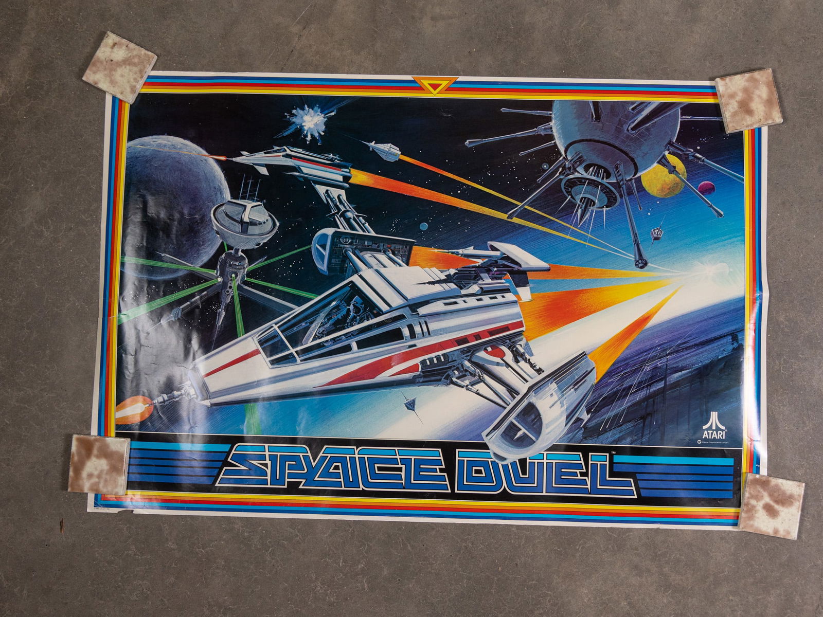 1982 Atari "Space Duel" Vintage Poster: 1982 Atari "Space Duel" Vintage Poster Size 35" x 24" Literature Brooks Auction – Online Auction Terms & Conditions Contact: (856) 694-2960 | info@brooks.auction READ BEFORE YOU BID: We