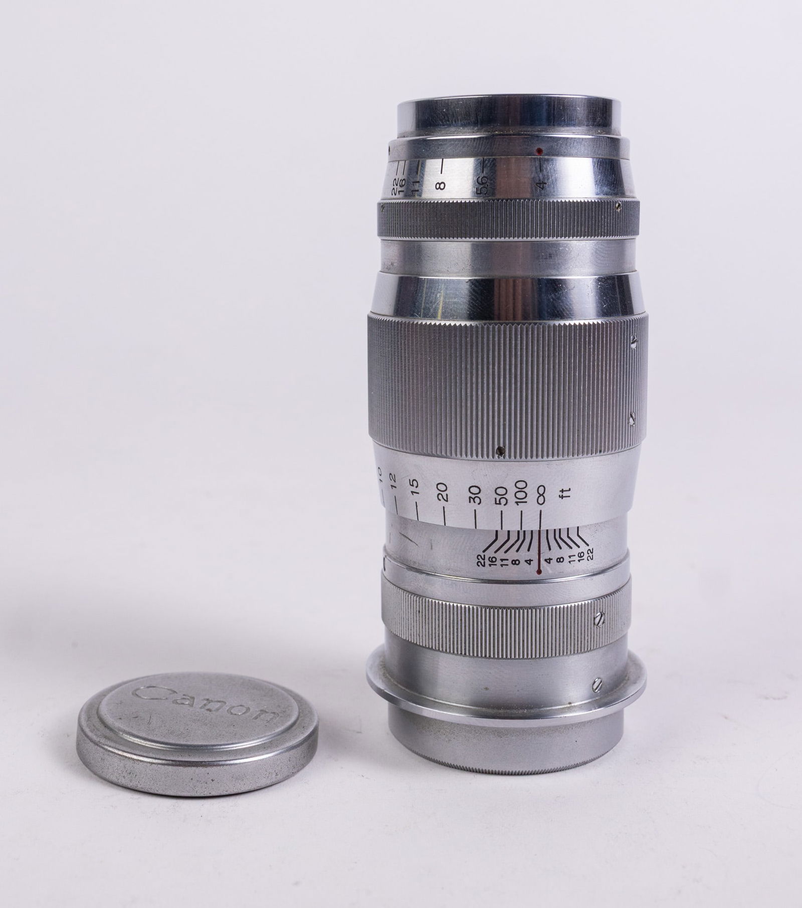 Canon 100mm F/4 Serenar LTM Lens: Canon 100mm F/4 Serenar LTM Lens. This lens for is for a Leica Thread Mount camera. Lens to appear in good condition but is not tested. Focus and aperture rings turn smoothly Literature Brooks Auction