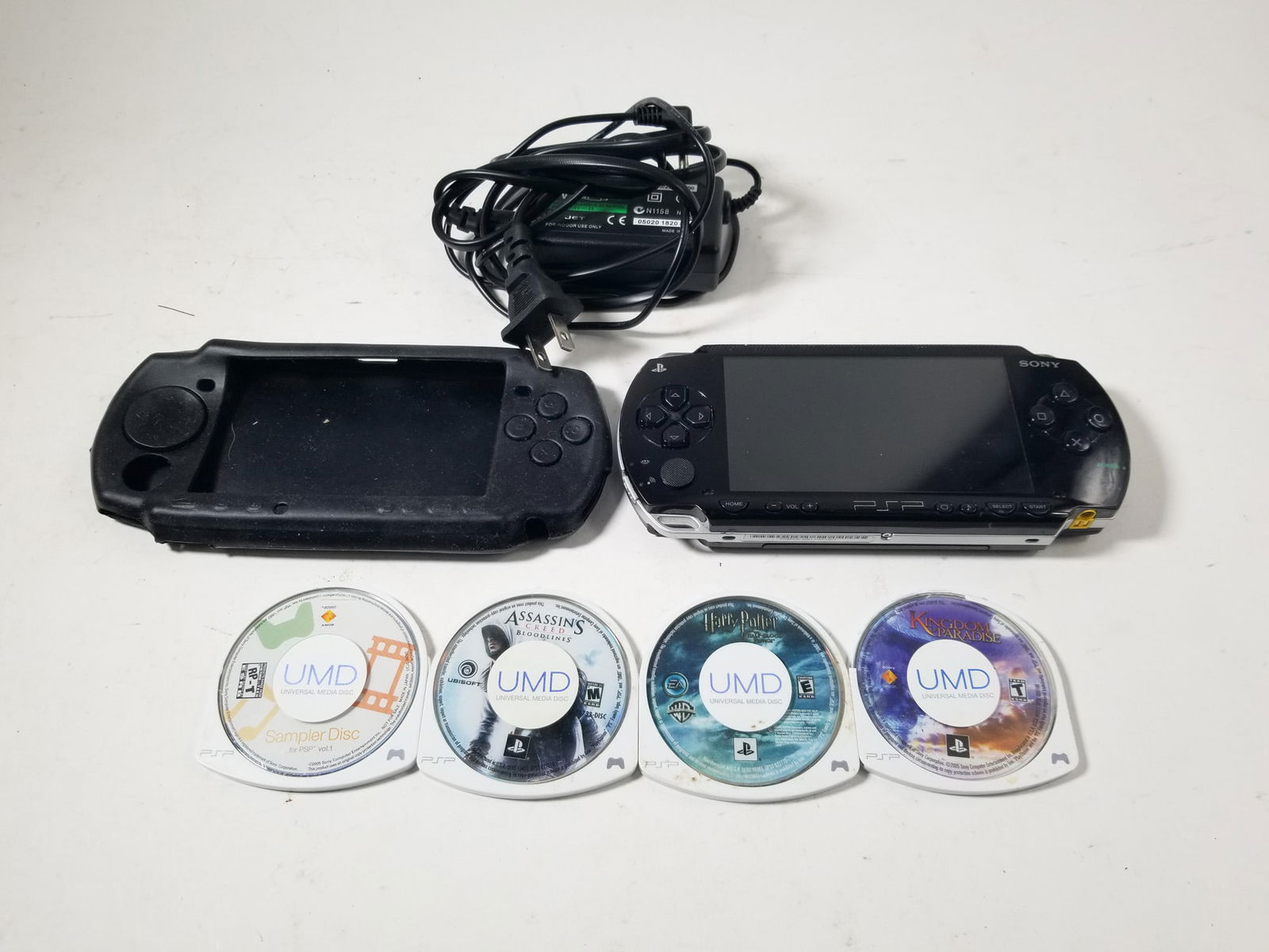 Playstation Portable PSP Handheld Console: Playstation Portable PSP Handheld Console, includes power cord, tested and working Size 7" x 12" x 12" Literature Brooks Auction – Online Auction Terms & Conditions Contact: (856) 694-2960 | in
