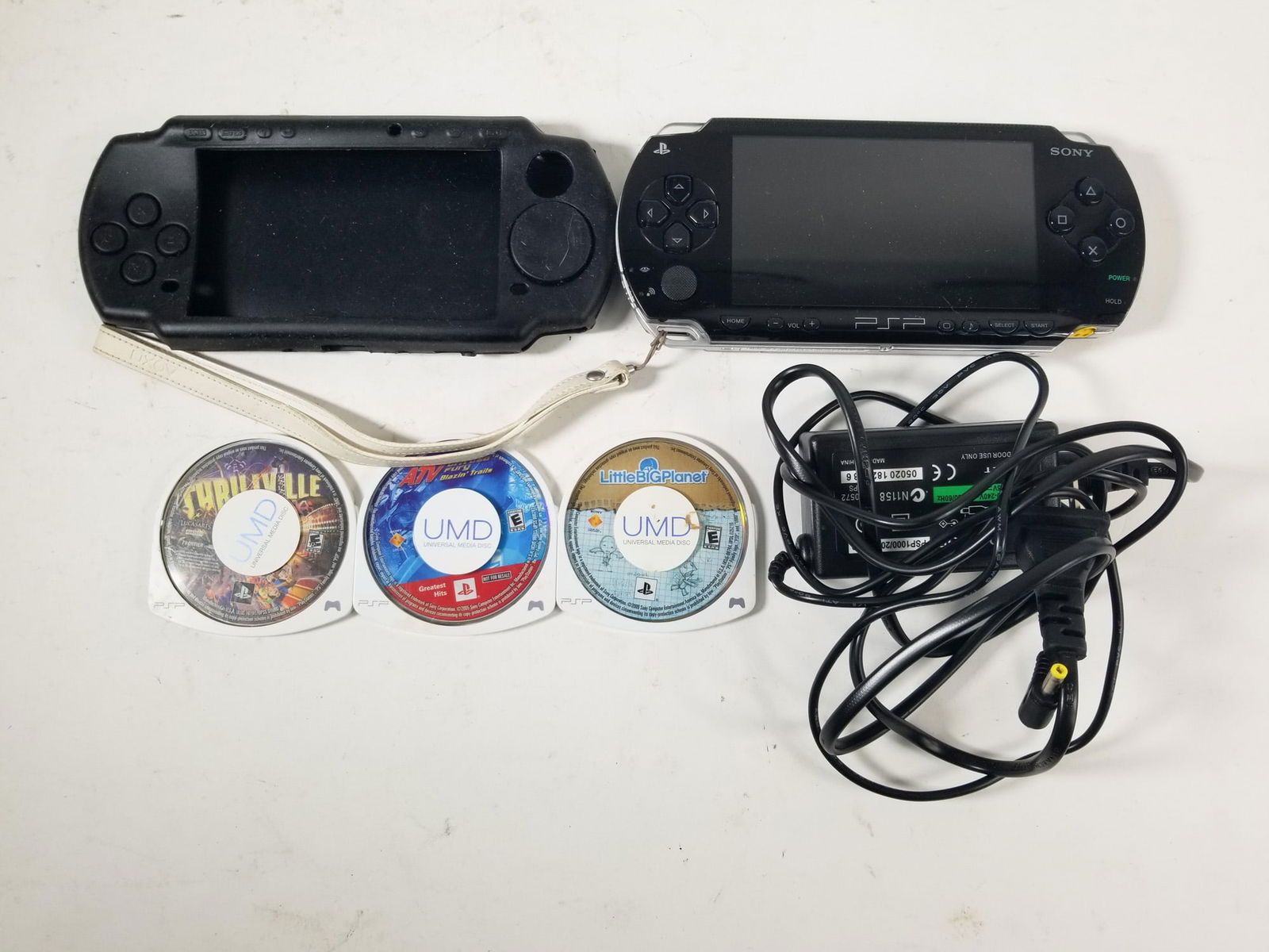 Playstation Portable PSP Handheld Console: Playstation Portable PSP Handheld Console, includes power cord, tested and workingSize7" x 12" x 12"LiteratureBrooks Auction – Online Auction Terms & Conditions Contact: (856) 694-2960 |