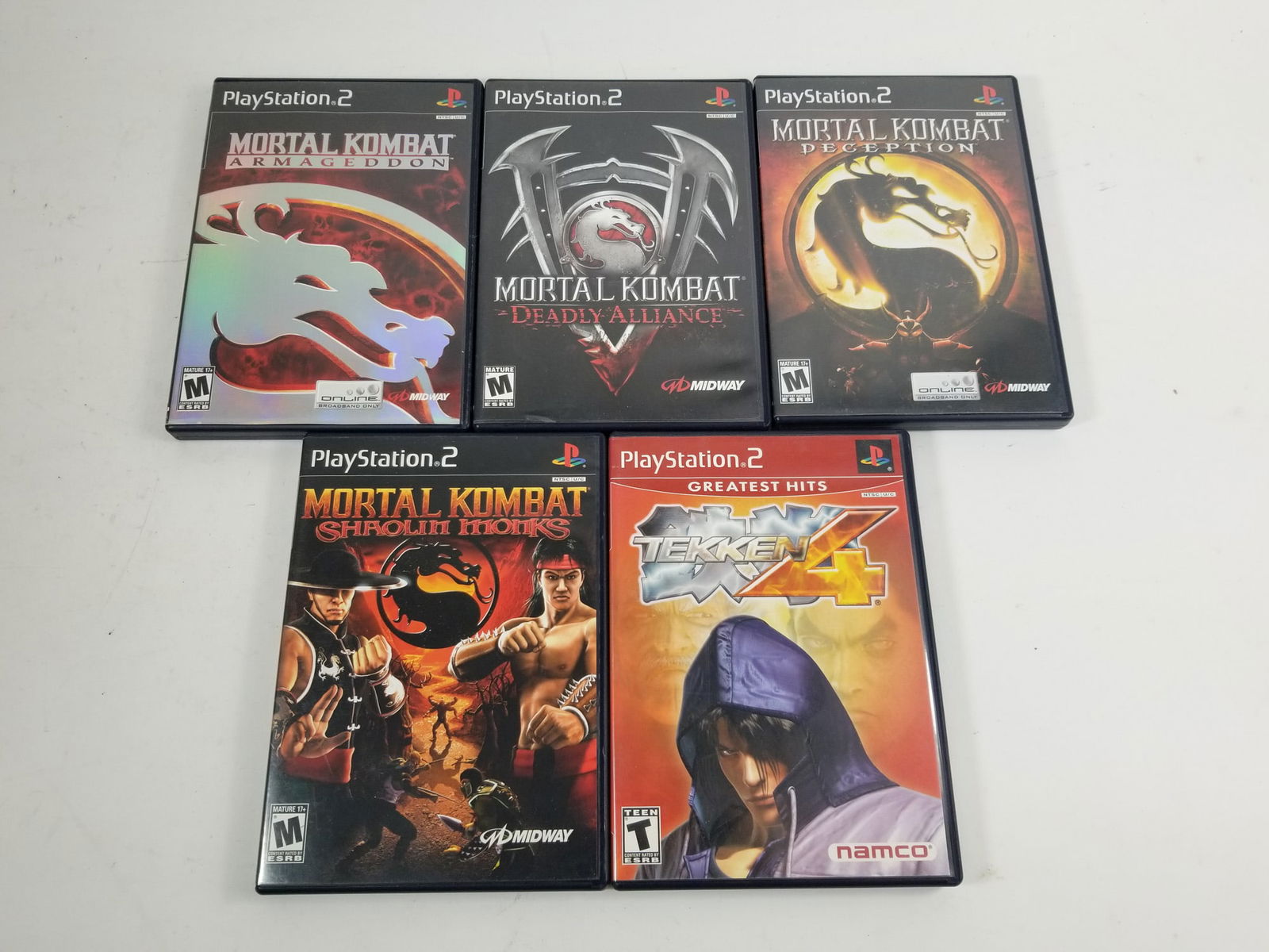 Mortal Kombat & Tekken PS2 Playstation 2 Games: Mortal Kombat & Tekken PS2 Playstation 2 GamesSize7" x 12" x 12"LiteratureBrooks Auction – Online Auction Terms & Conditions Contact: (856) 694-2960 | info@brooks.auction READ BEFORE YOU BID: